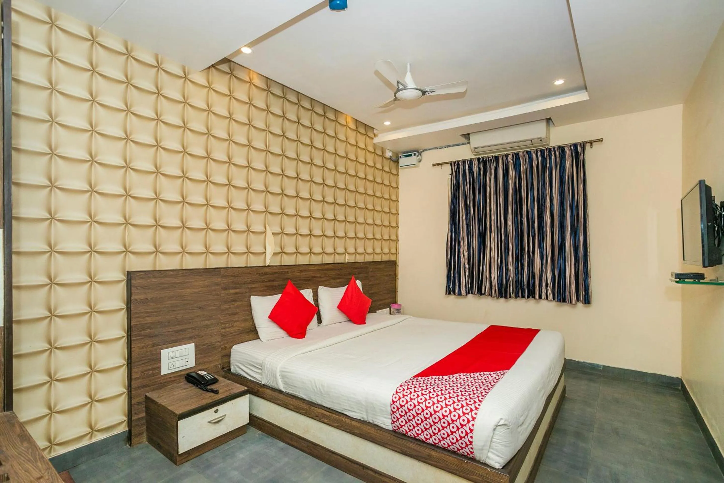 Bedroom in Collection O Indian Suites Near Sitara Restaurant