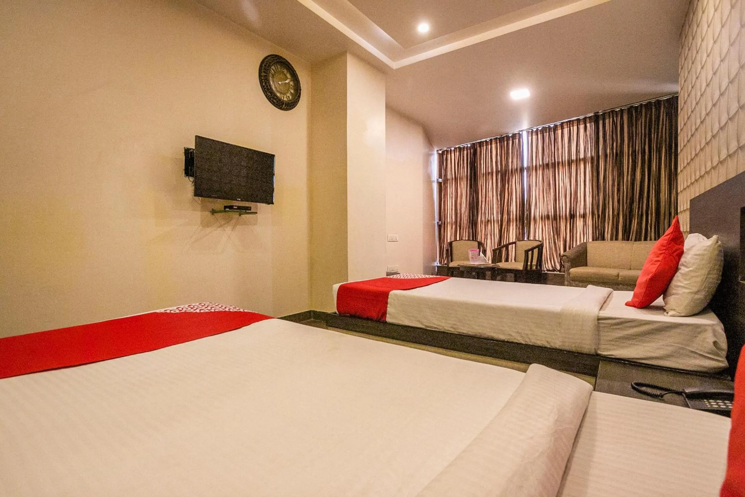 Bedroom in Collection O Indian Suites Near Sitara Restaurant