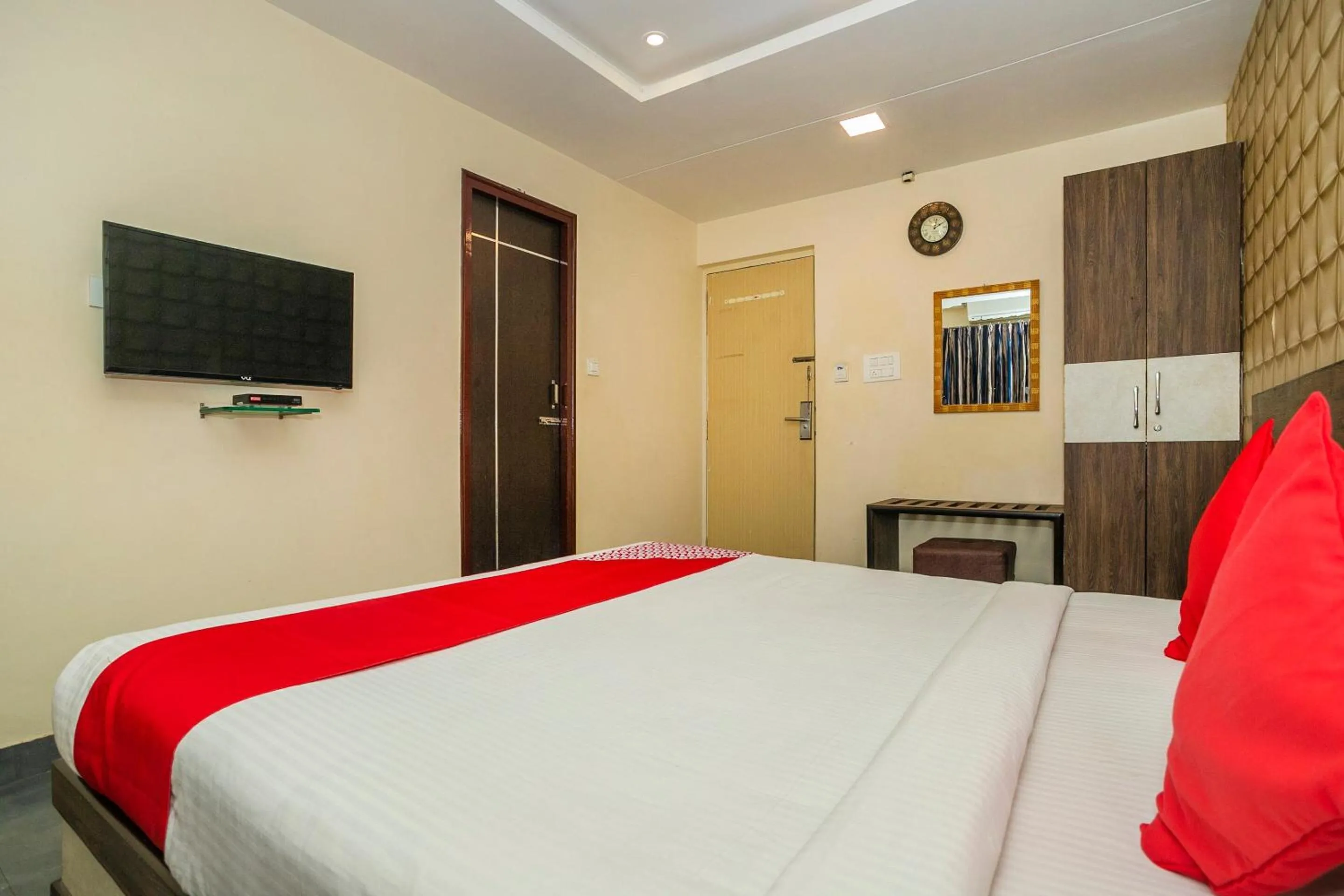 Bedroom in Collection O Indian Suites Near Sitara Restaurant