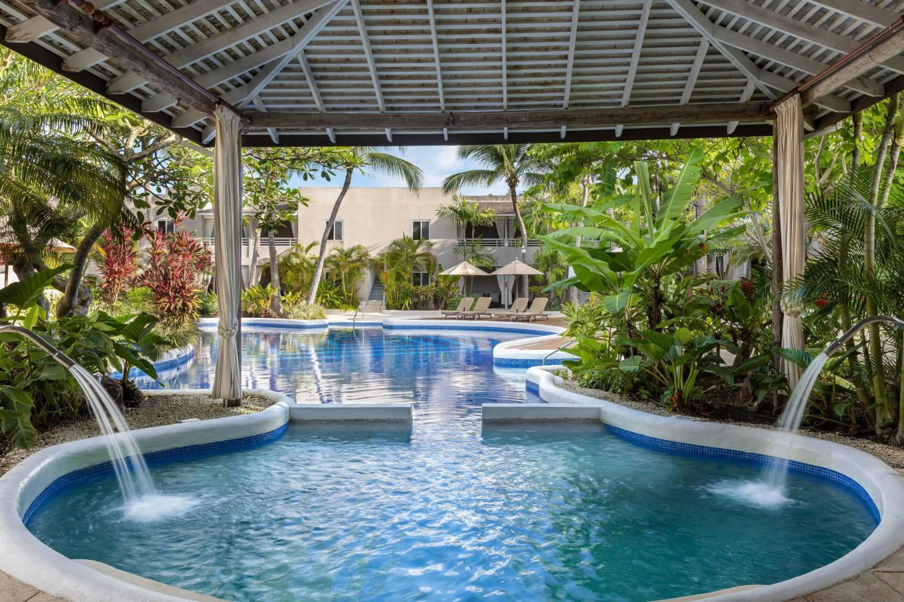 Swimming pool in Waves Resort & Spa, Barbados, An Autograph Collection All-Inclusive Resort