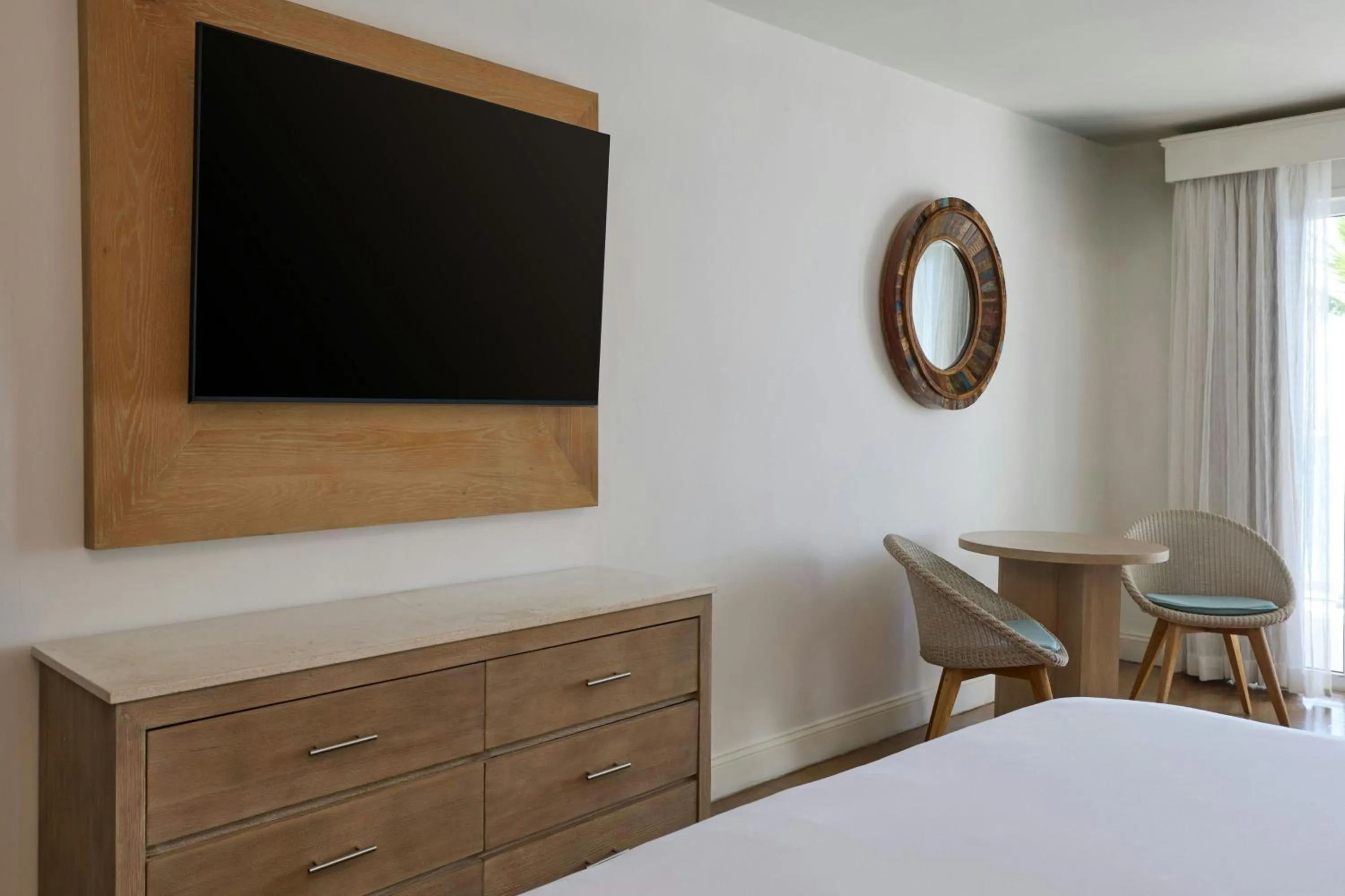 Photo of the whole room, Bed in Waves Resort & Spa, Barbados, An Autograph Collection All-Inclusive Resort