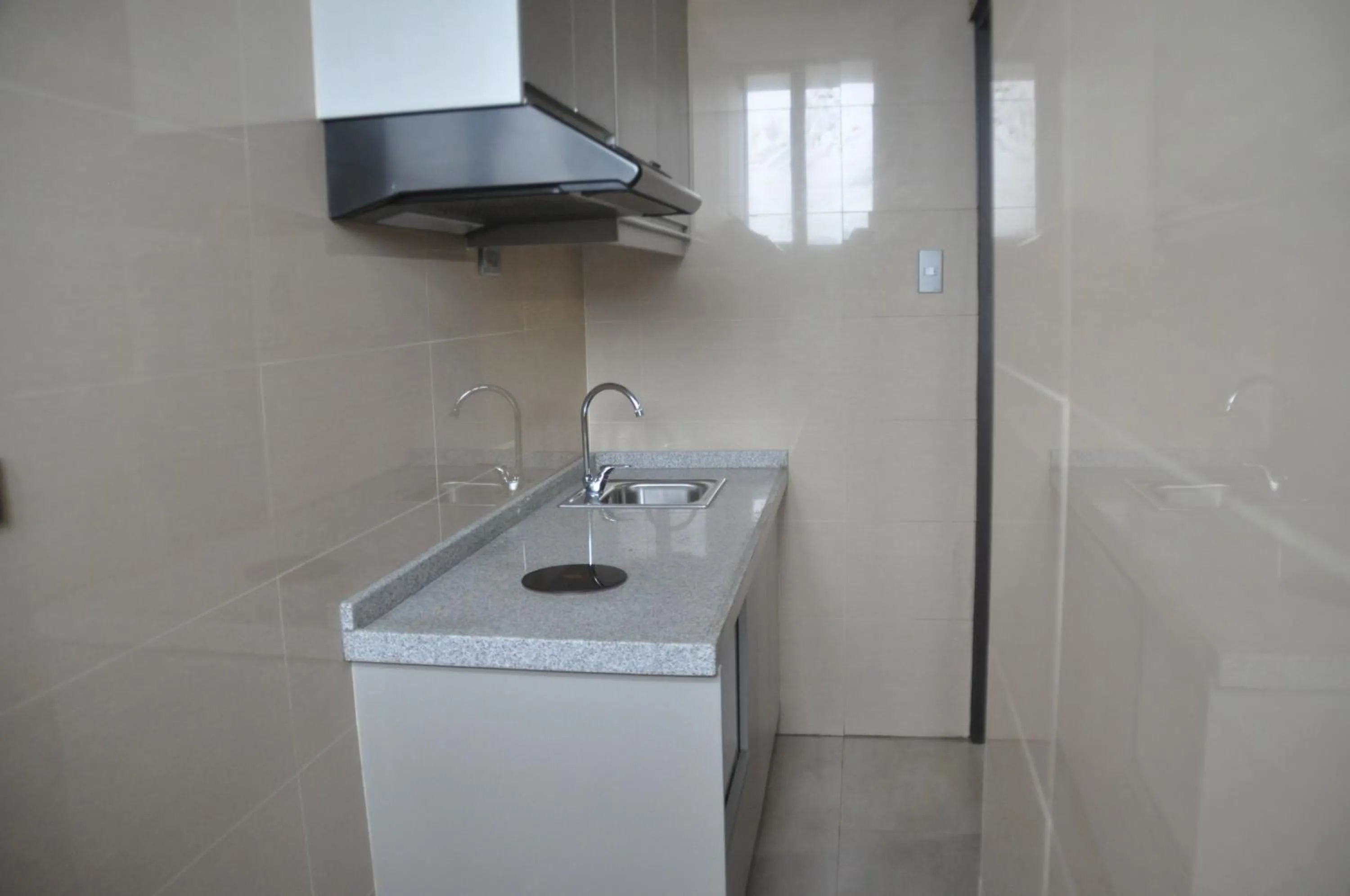 Kitchen or kitchenette in Mezzo Hotel