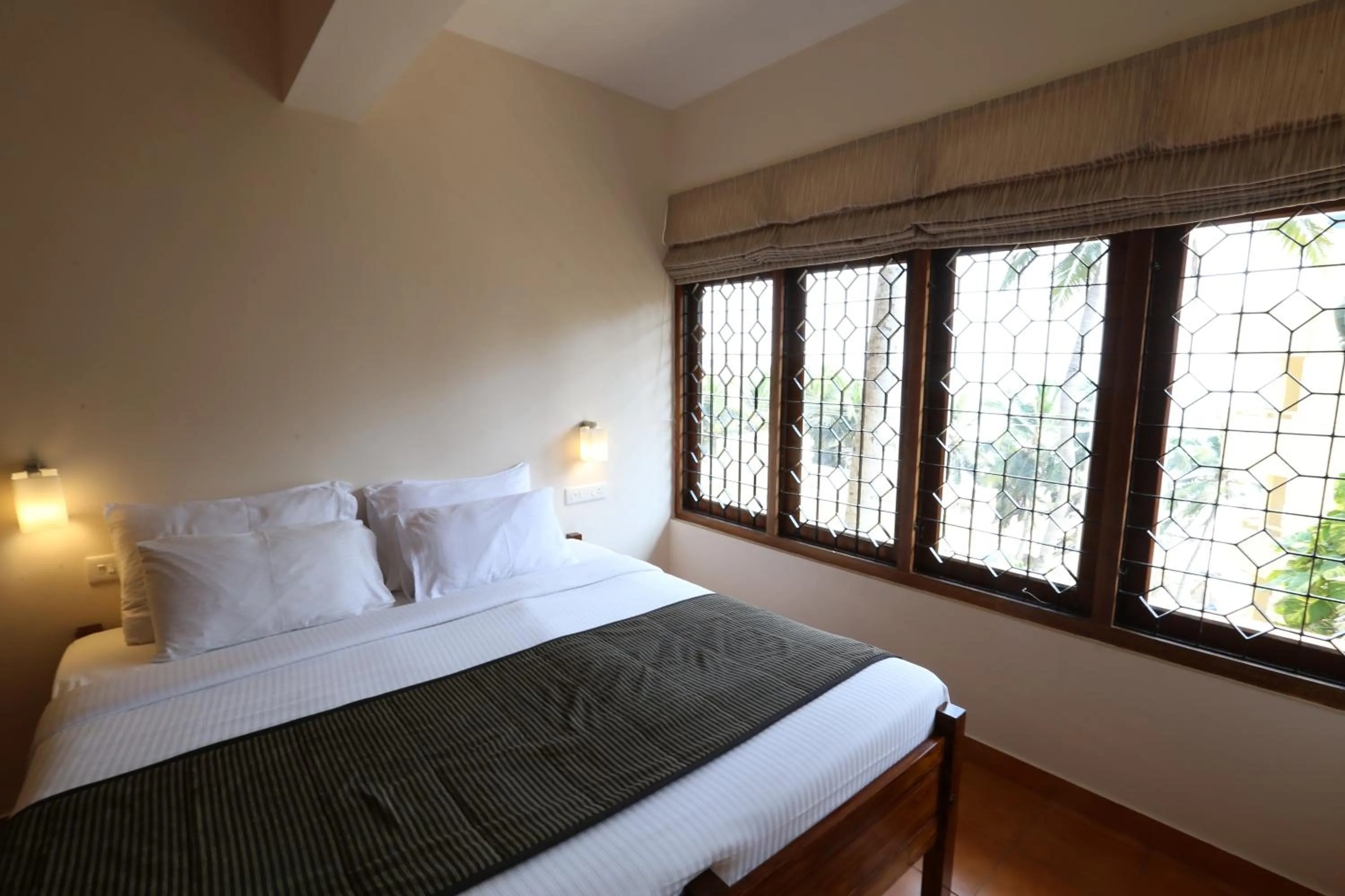 Bed in Abad Serviced Villas