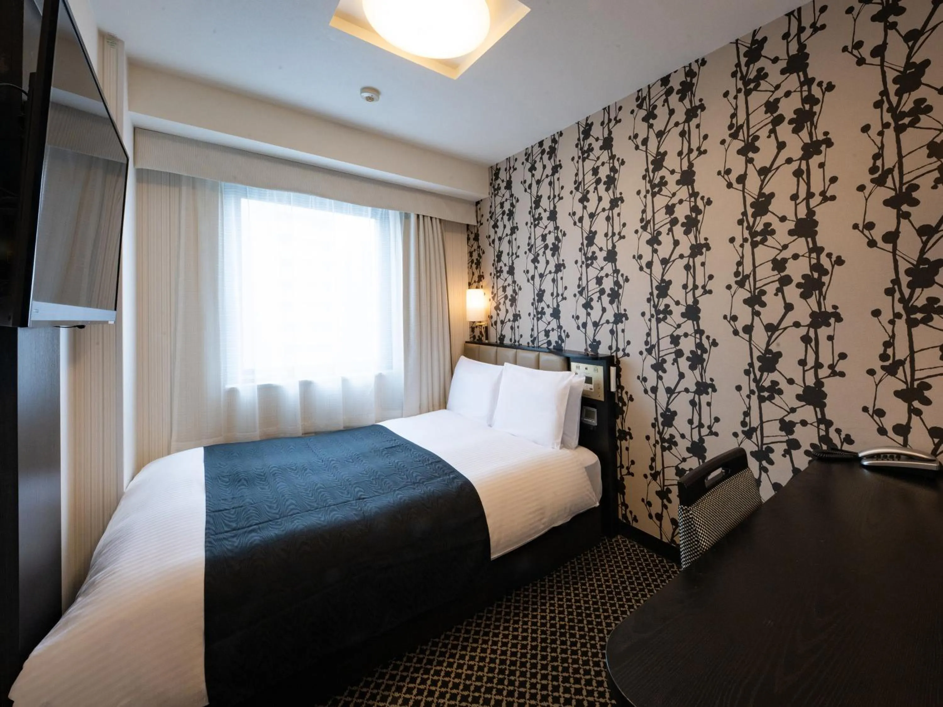 Bed in APA Hotel Nagoya Sakae Higashi