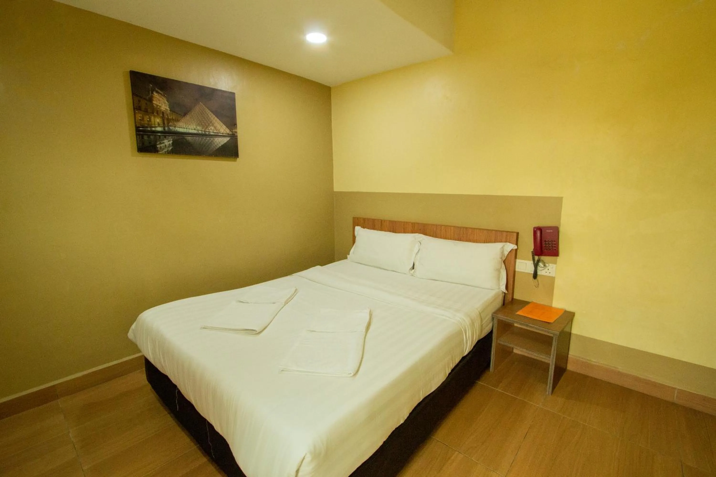 Photo of the whole room, Bed in Expo Hotel