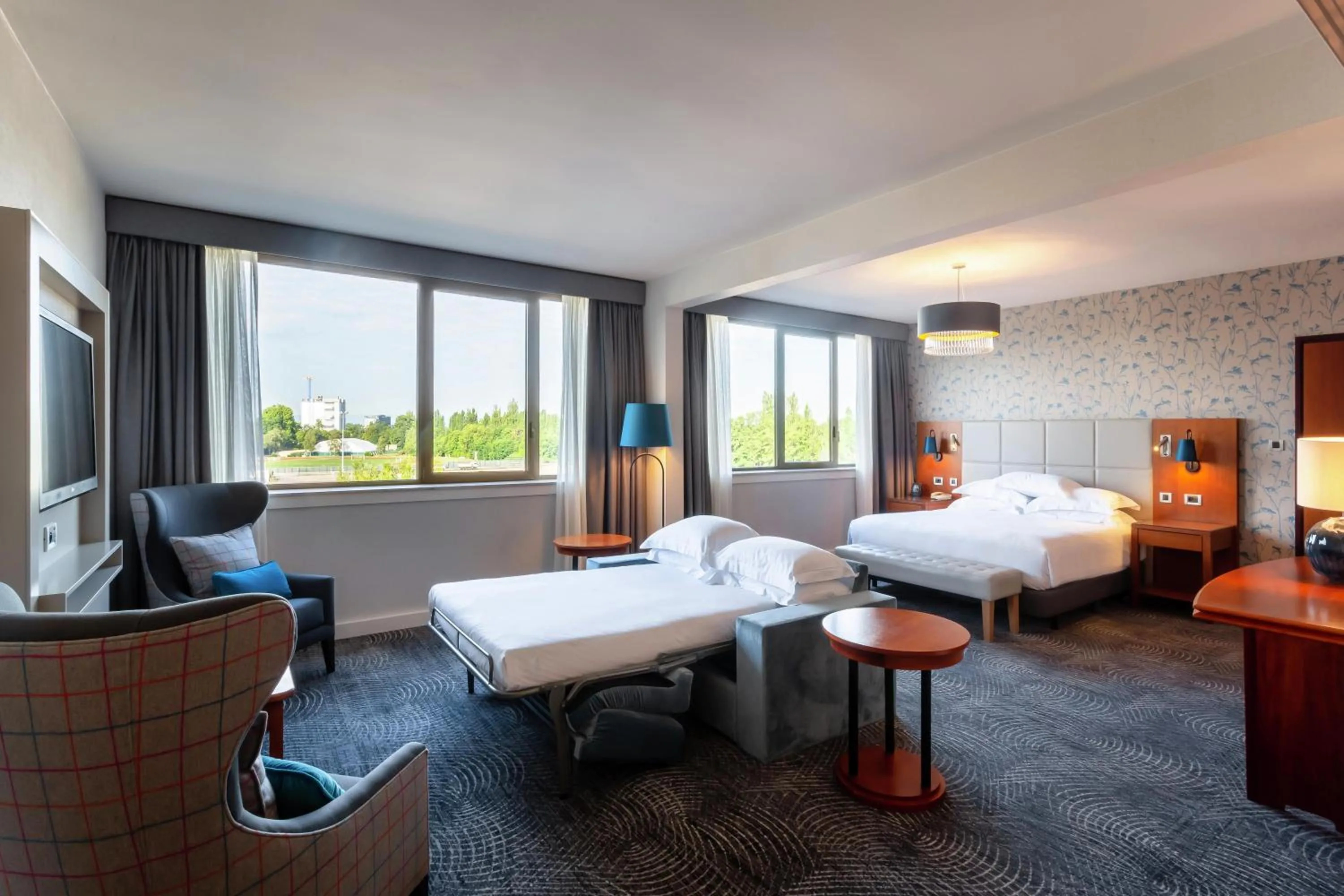Living room, Bed in Hilton Strasbourg