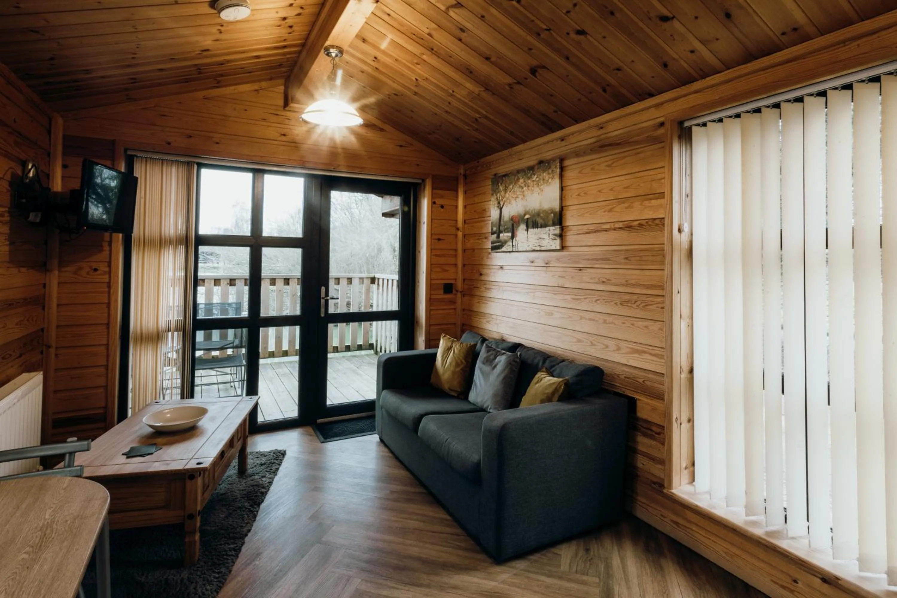 Living room in Woodlakes Park By Liv Retreats