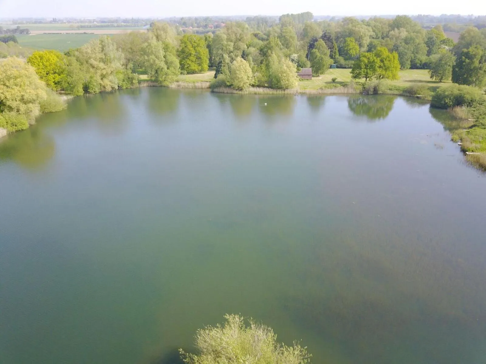 Lake view in Woodlakes Park By Liv Retreats