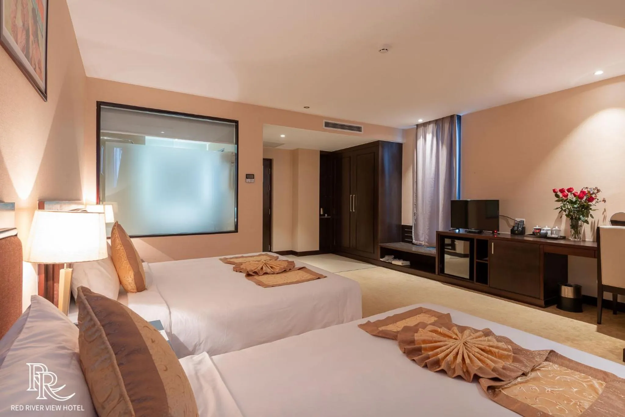 Bed in Red River View Hotel