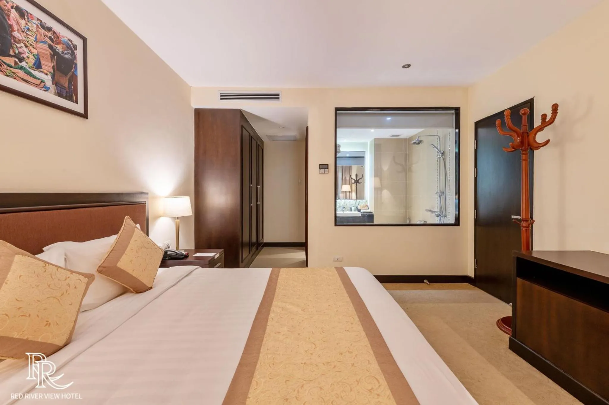 Bed in Red River View Hotel