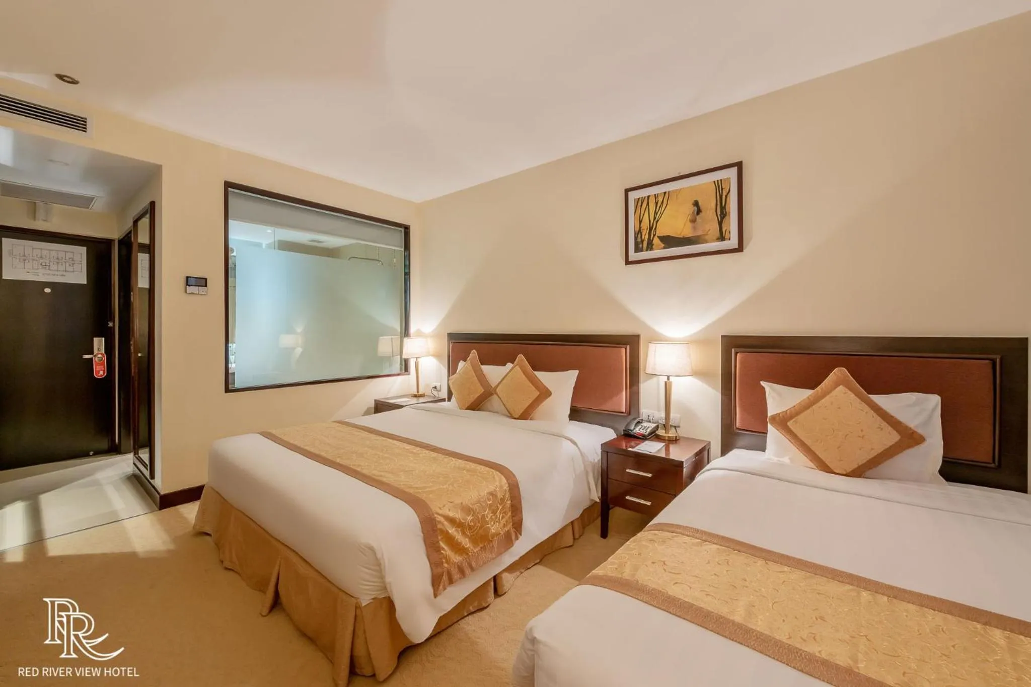 Bed in Red River View Hotel