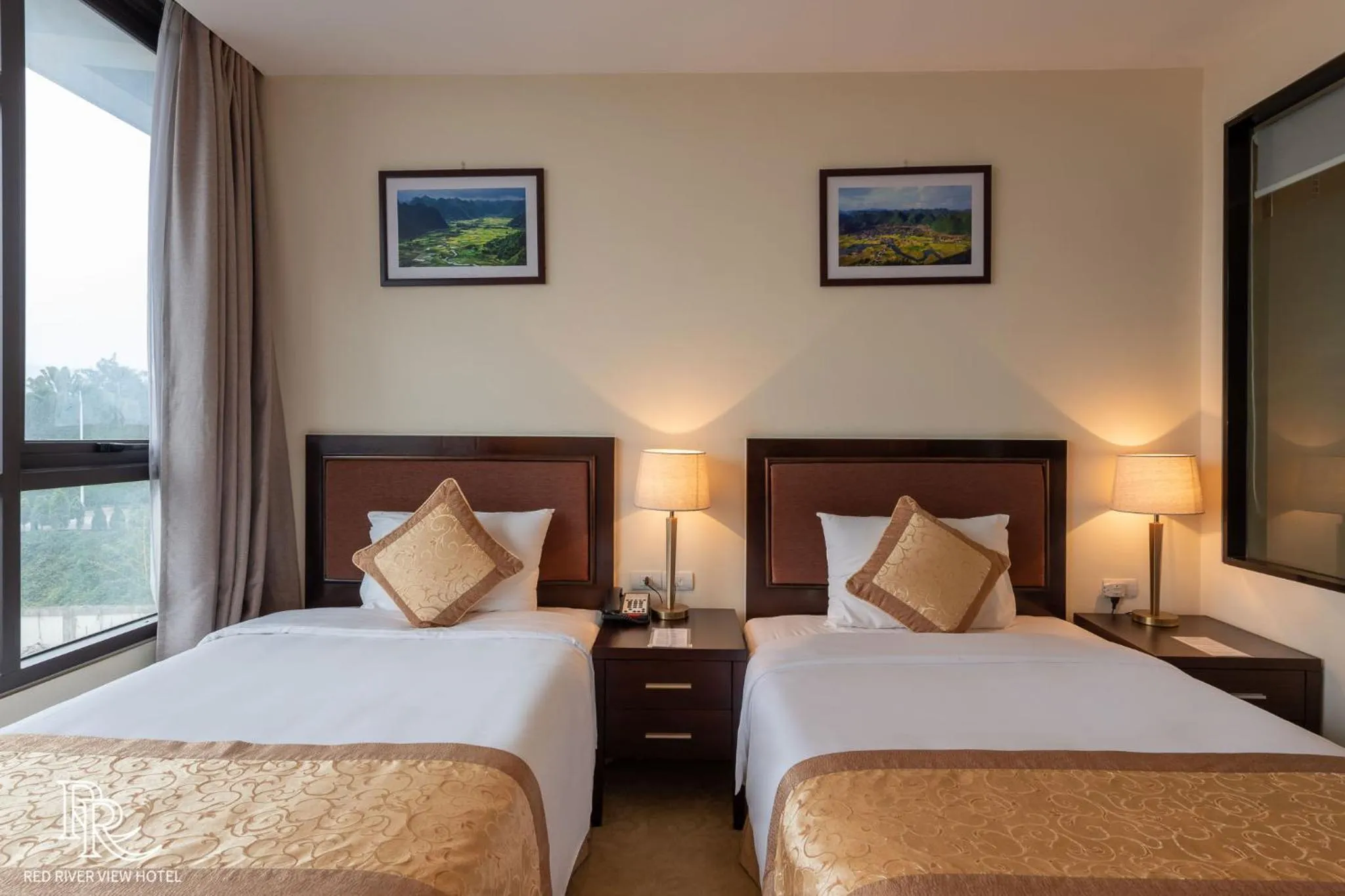 Bed in Red River View Hotel