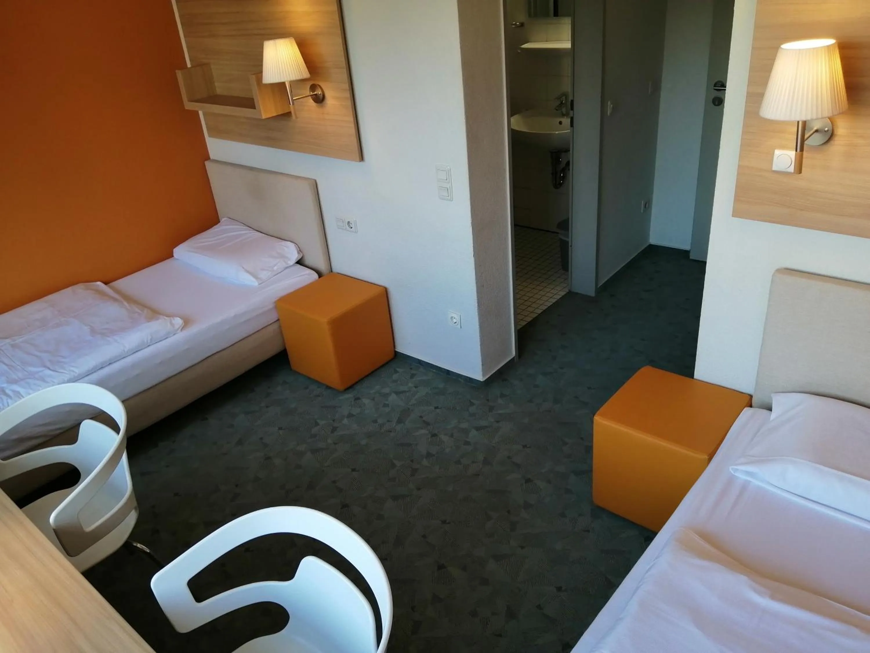 Photo of the whole room, Bed in DRK-Tagungshotel-Dunant