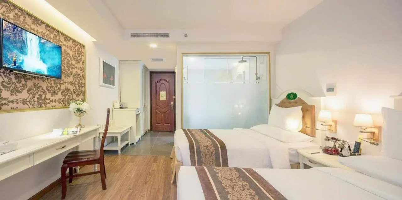 Bed in Isena Nha Trang Hotel