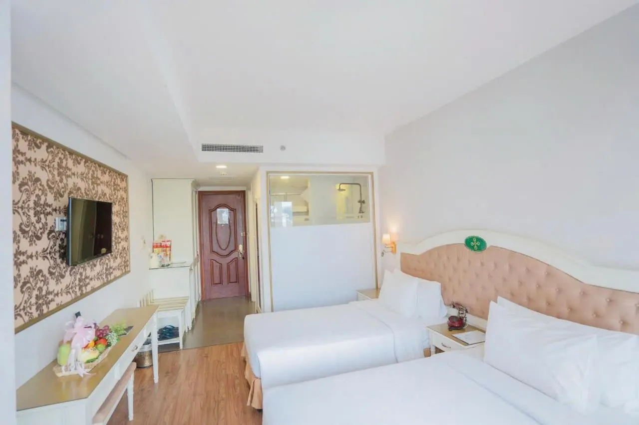 Bed in Isena Nha Trang Hotel