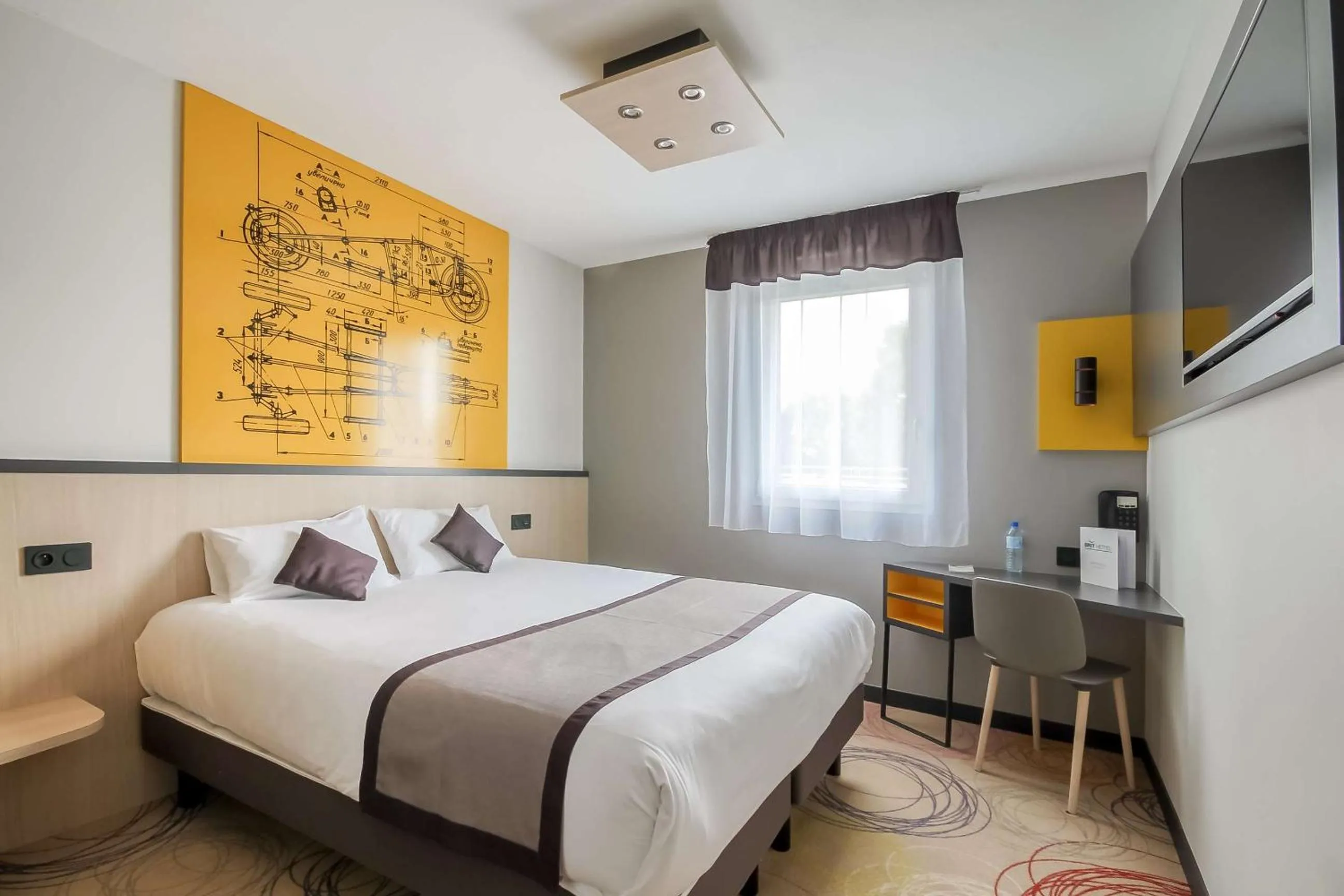 Bedroom, Bed in Brit Hotel Le Cottage Le Mans Sud