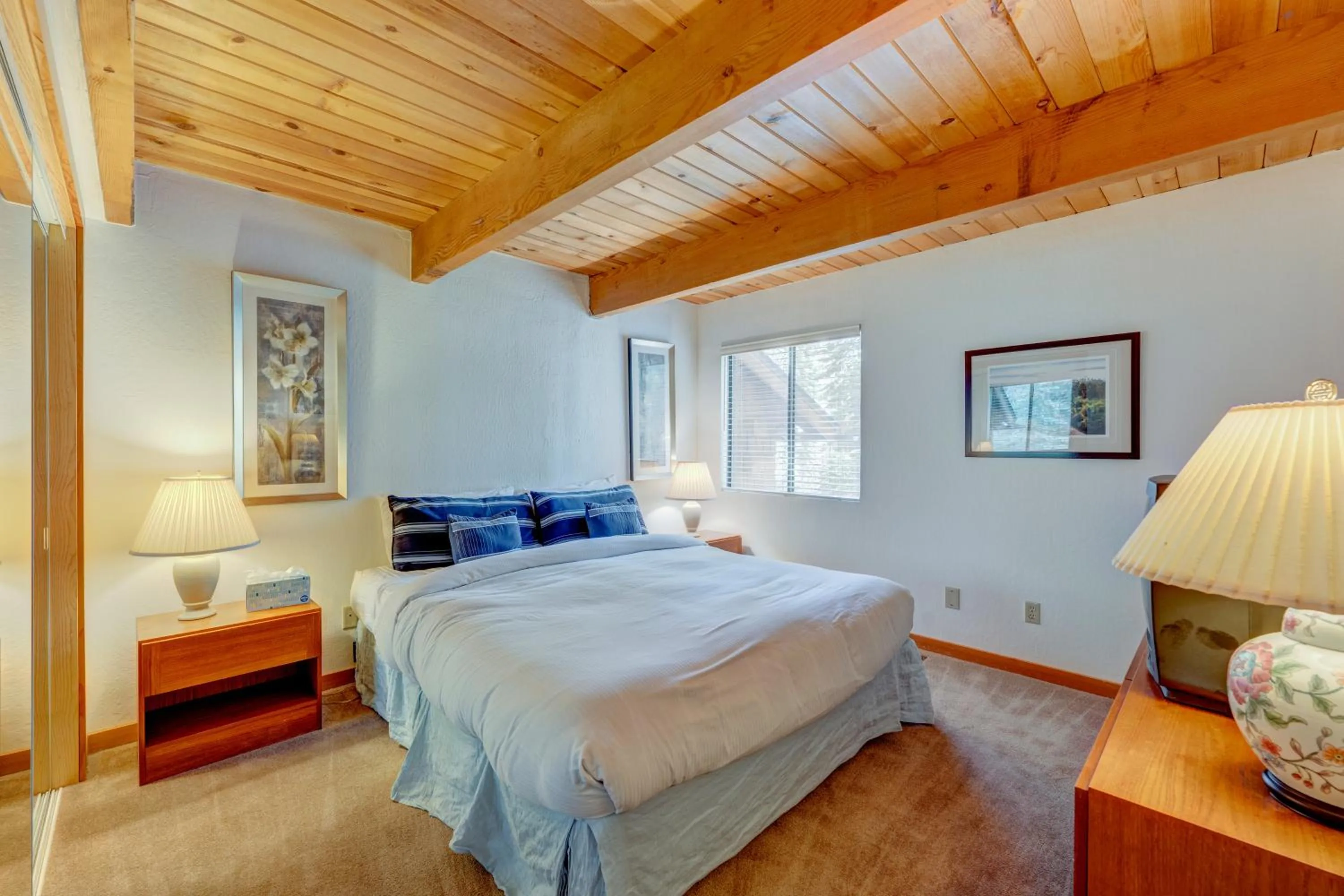 Bed in Beaver Pond Northstar Luxury Chalet with Hot Tub