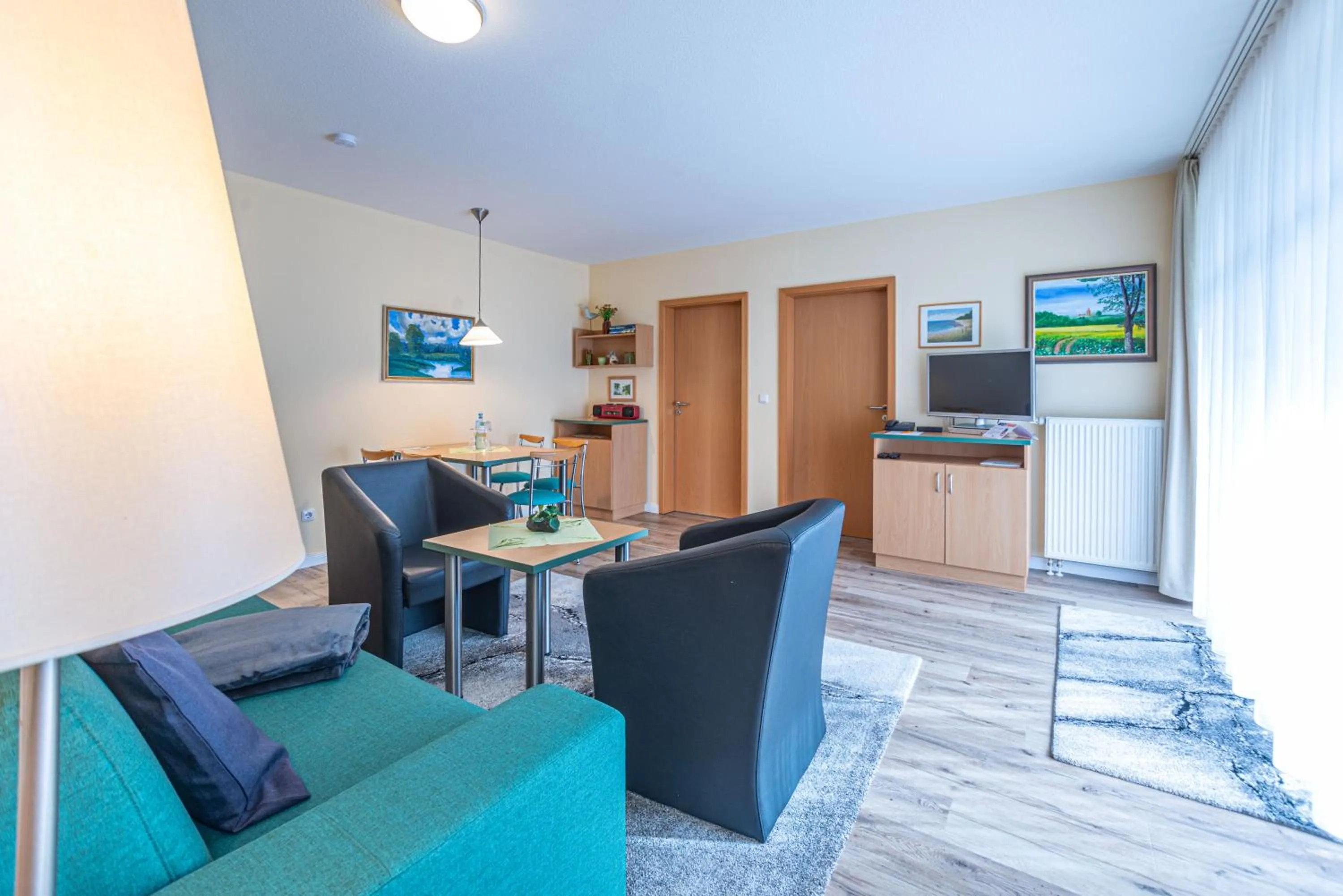 Photo of the whole room in Am Weststrand Apartmenthaus Waldeck