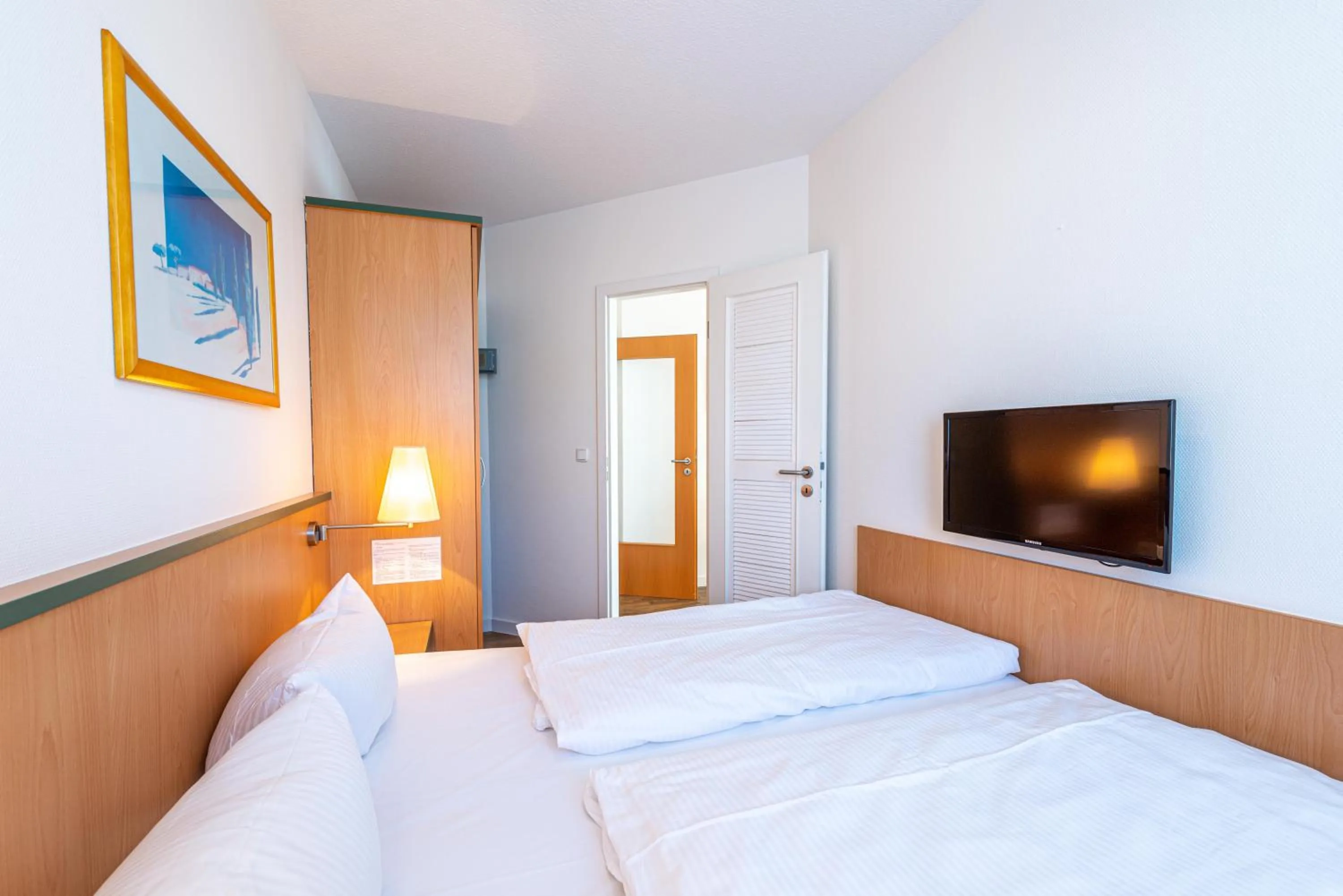 Photo of the whole room, Bed in Am Weststrand Apartmenthaus Waldeck