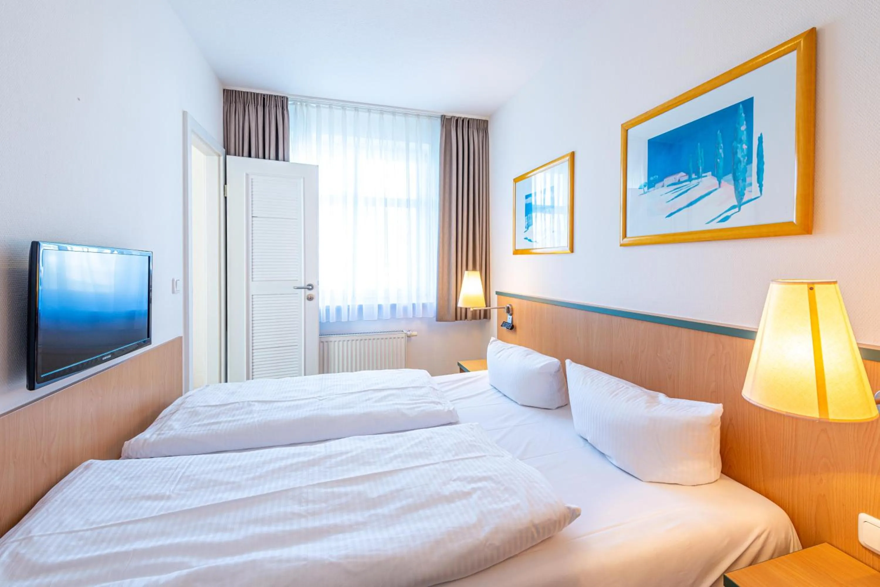 Photo of the whole room, Bed in Am Weststrand Apartmenthaus Waldeck