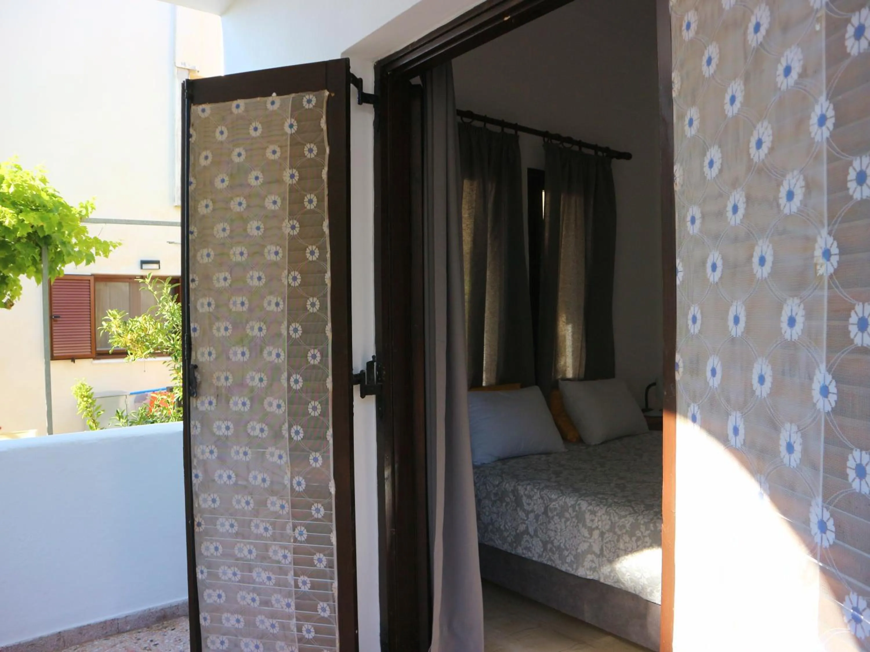 Bedroom in Oliaria Apartments
