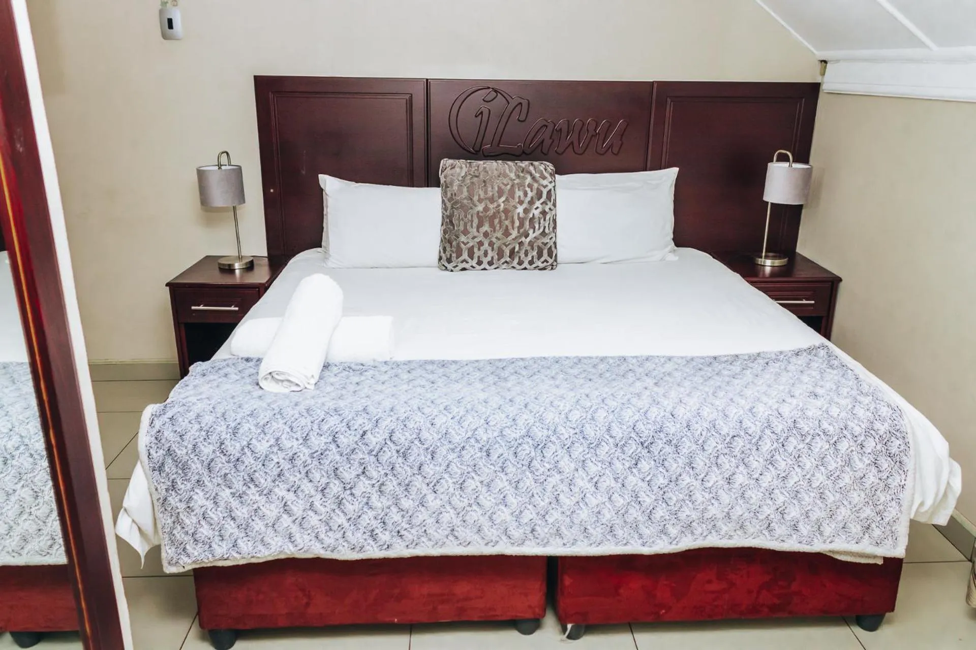 Bed in New England Guest House by Ilawu