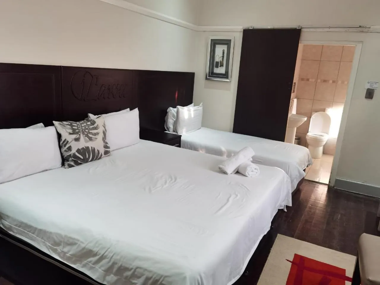 Bed in New England Guest House by Ilawu