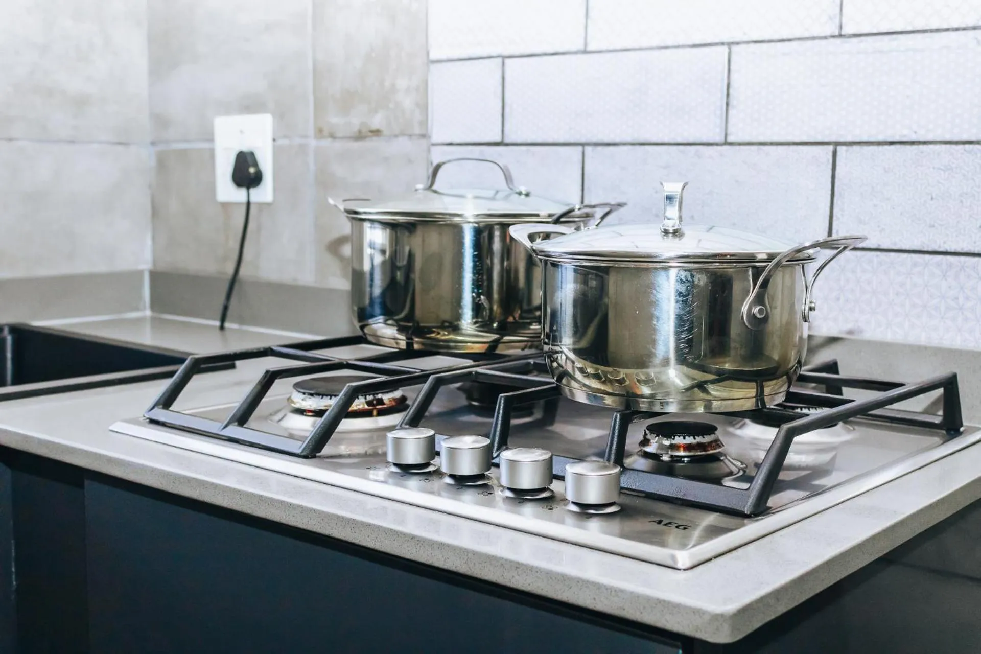 stove in New England Guest House by Ilawu