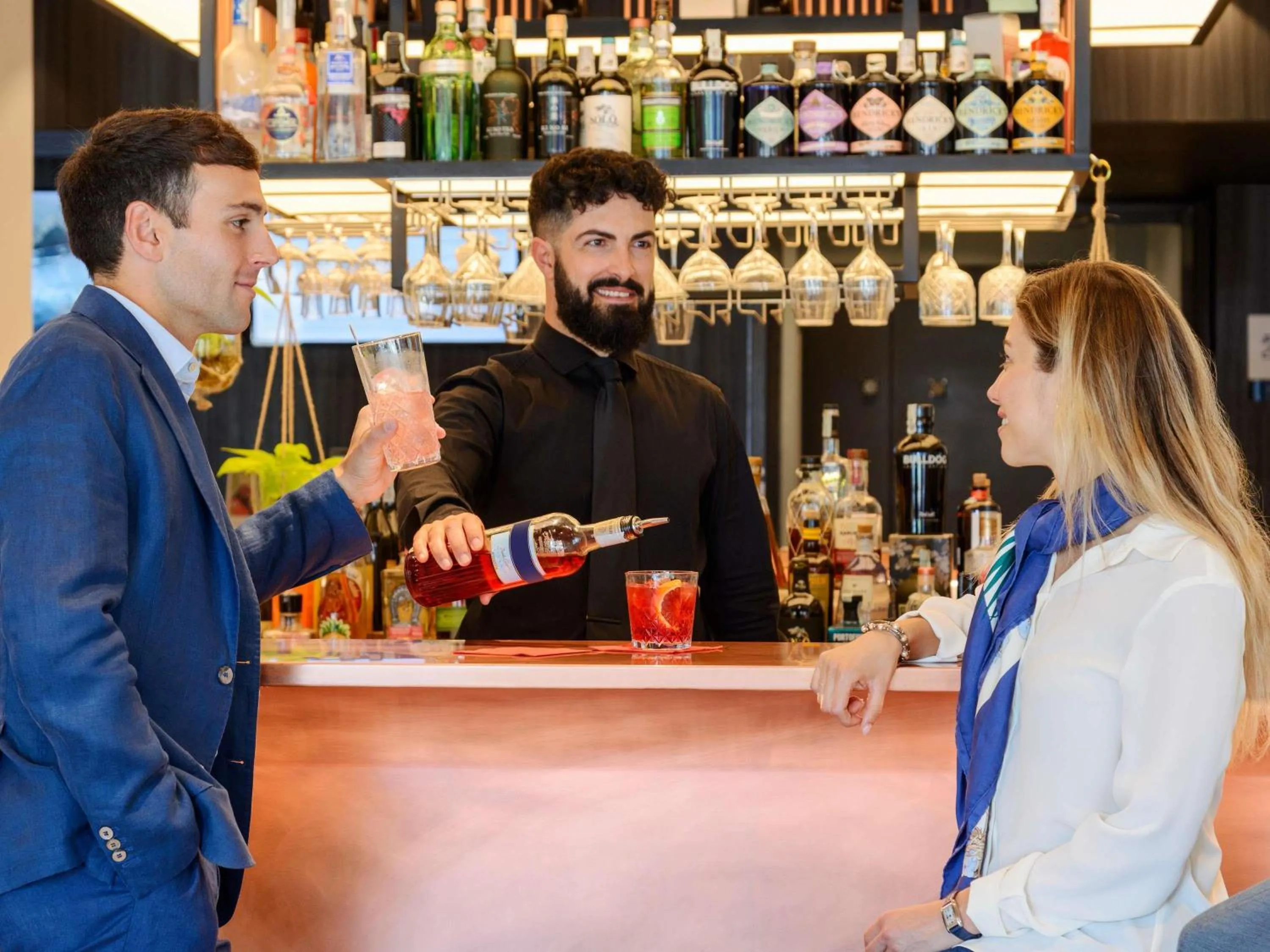 Lounge or bar in Novotel Parma Centro