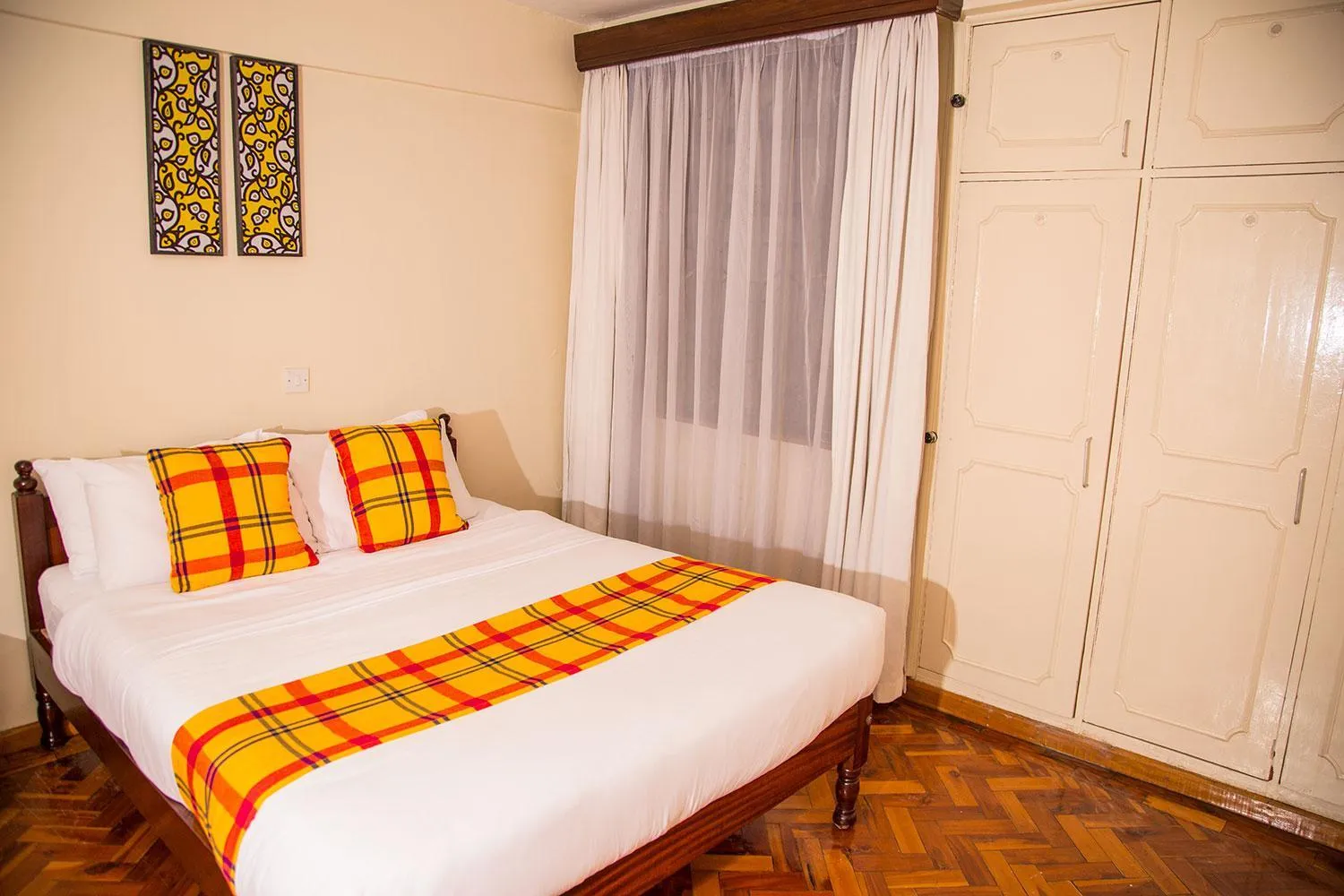 Bed in Njema Court Apartment