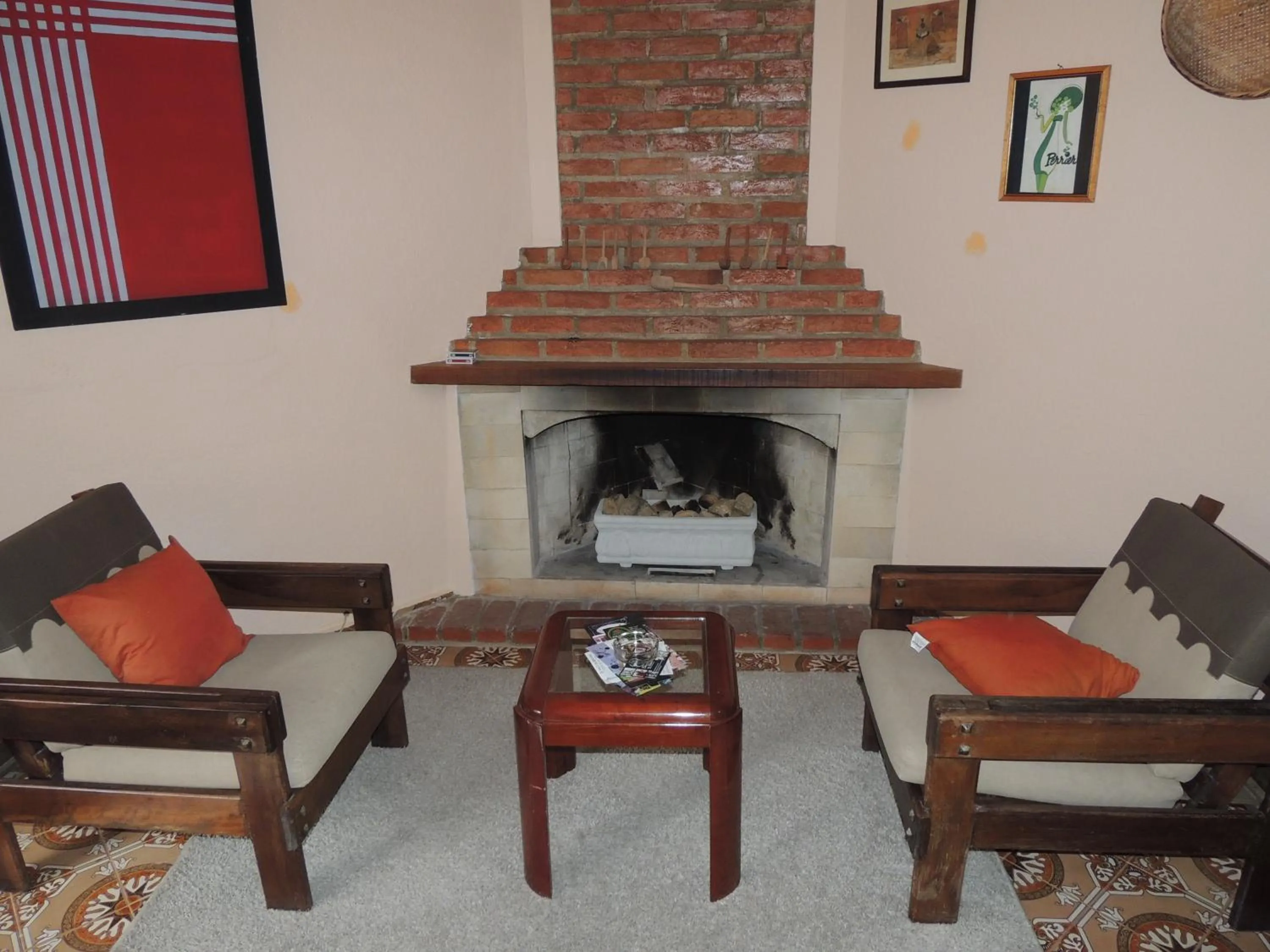 Communal lounge/ TV room in Tô na Roça