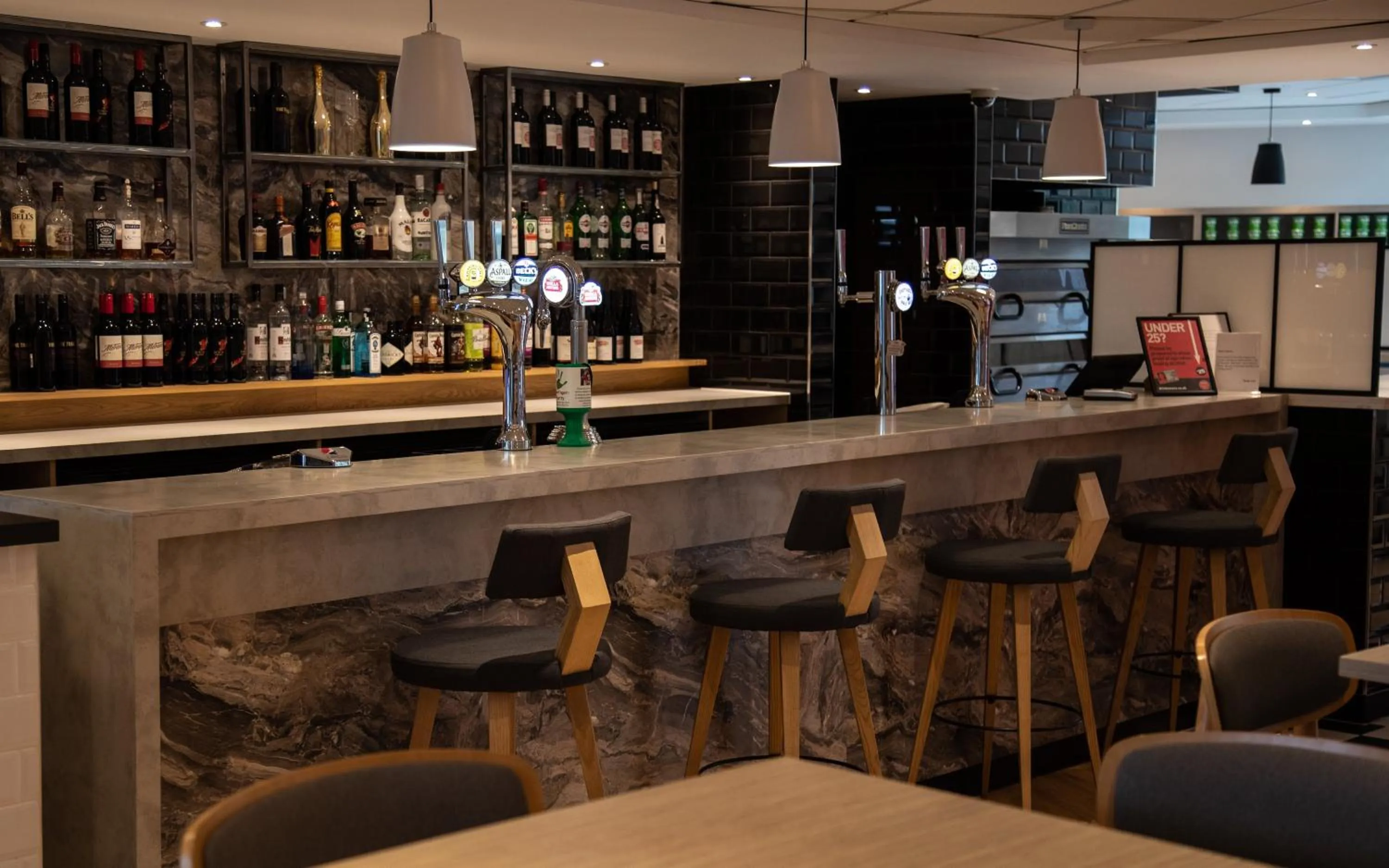 Lounge or bar in Holiday Inn Express London Stansted Airport by IHG