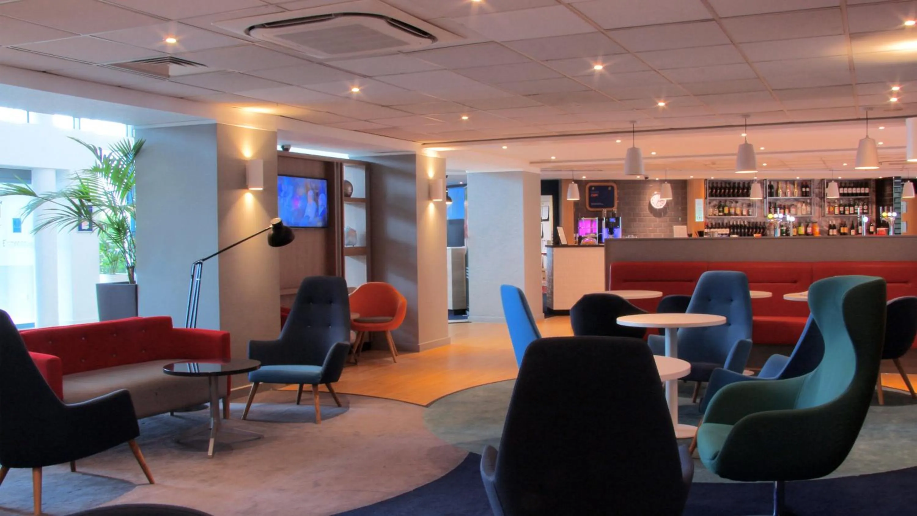 Lounge or bar in Holiday Inn Express London Stansted Airport by IHG