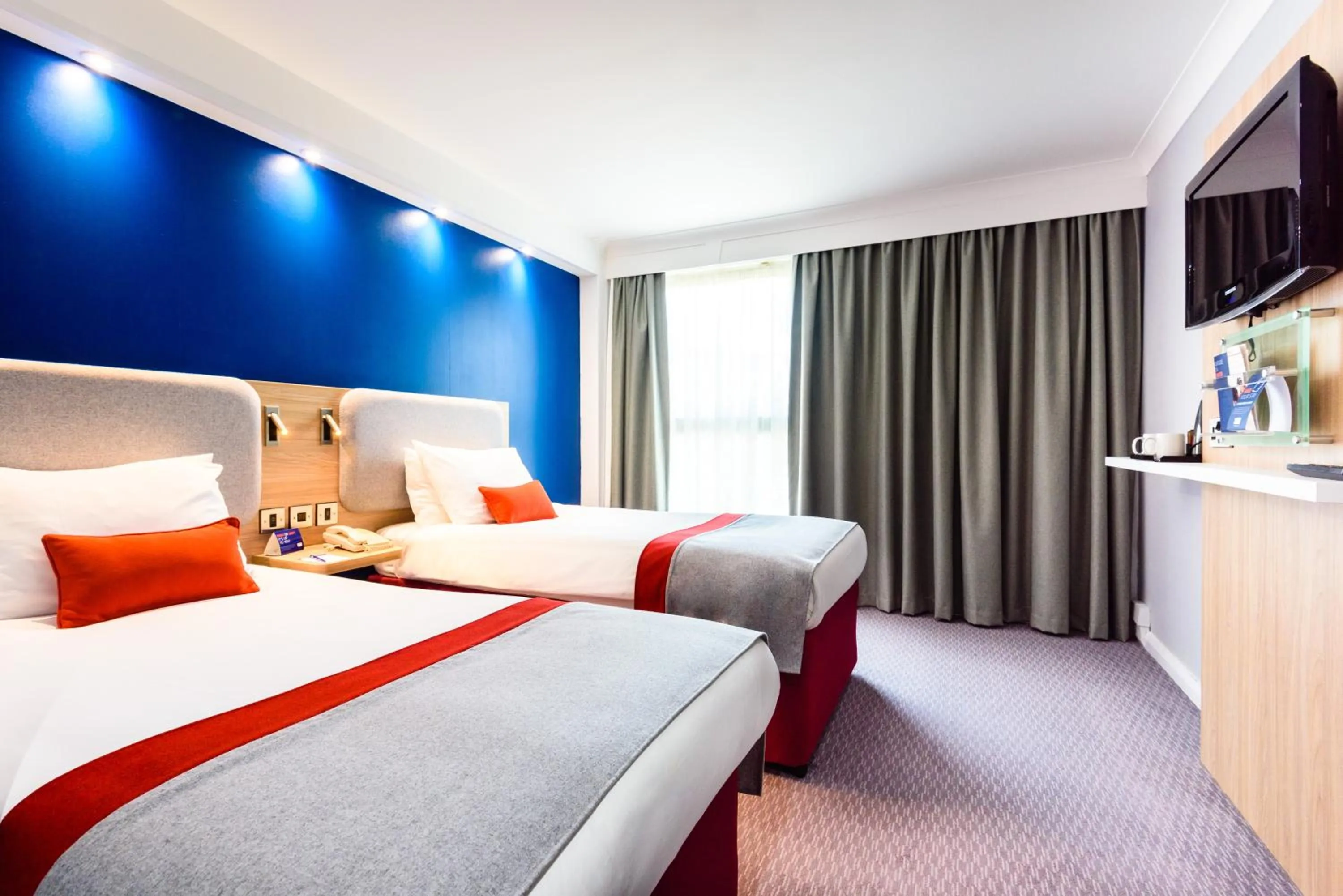 Bed in Holiday Inn Express London Stansted Airport by IHG