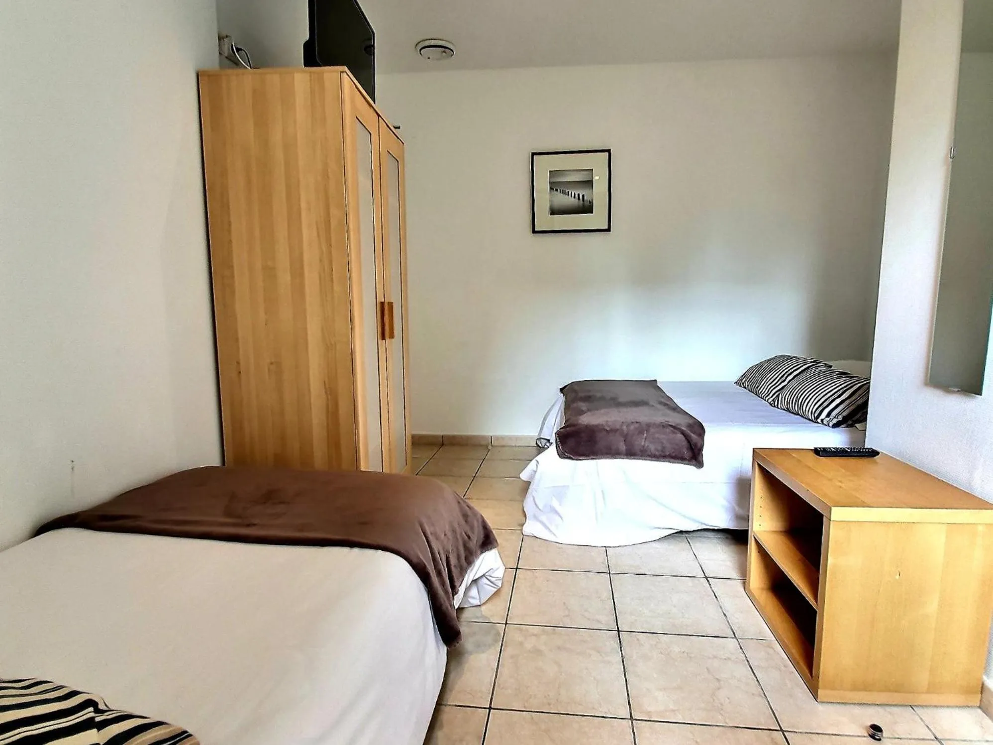 Bed in Atlantis Hôtel