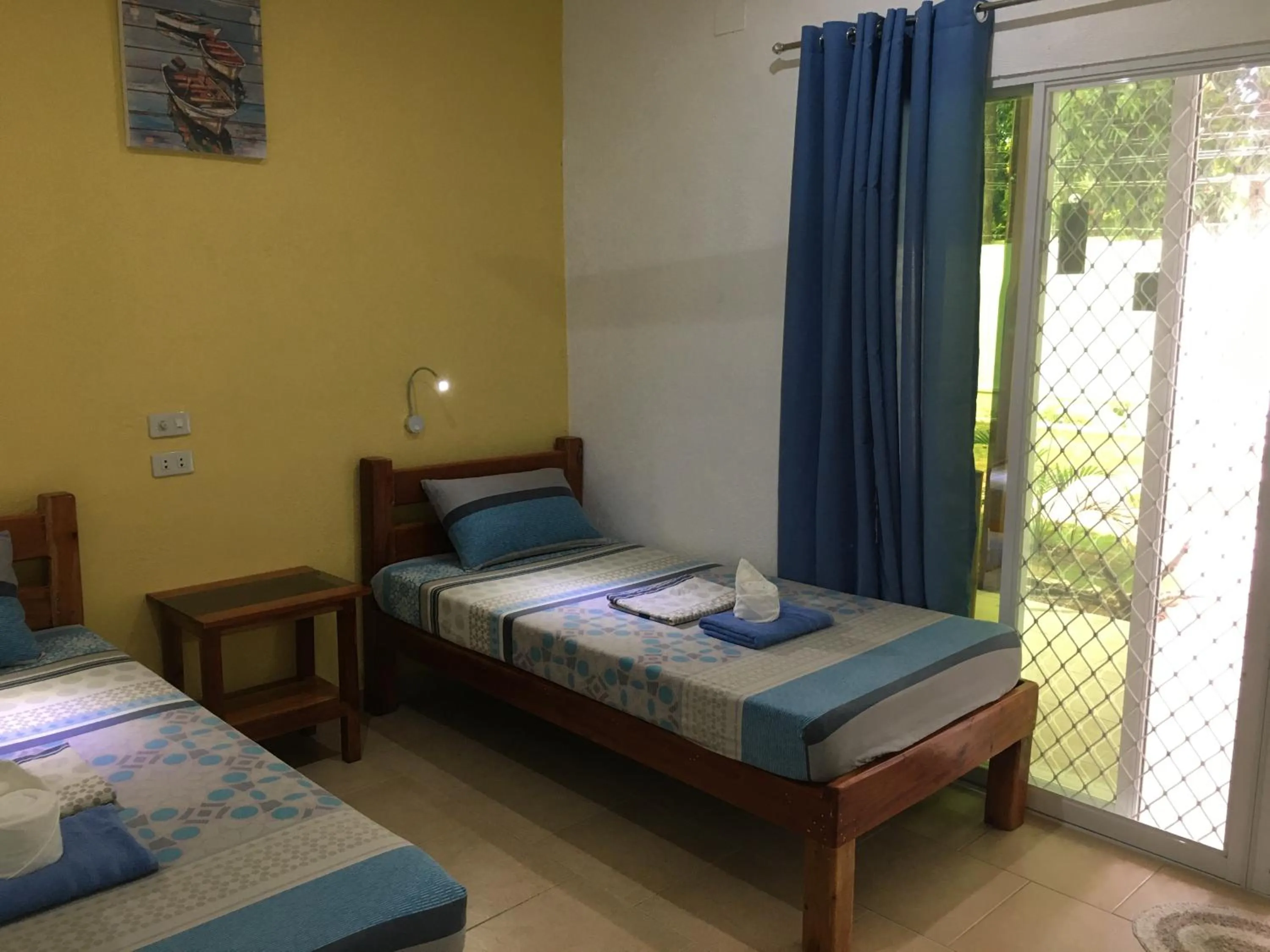 Bed in Alona Gecko Inn