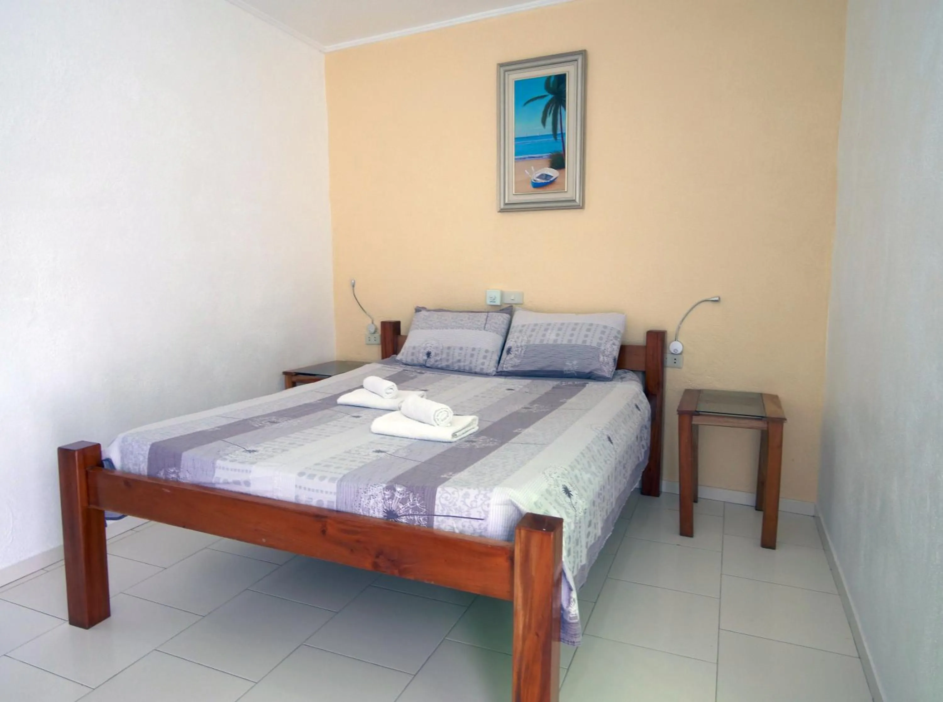 Bed in Alona Gecko Inn