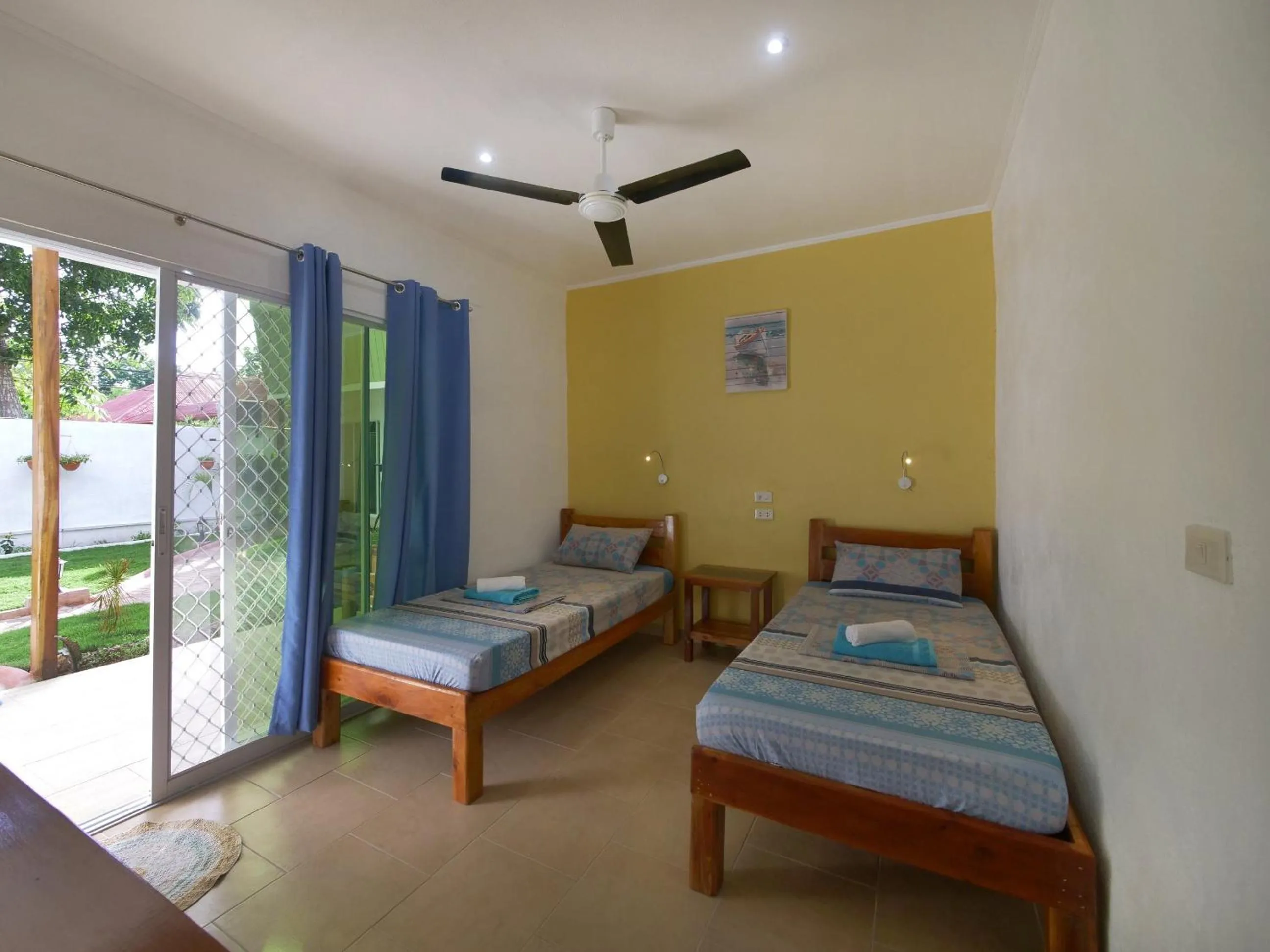 Bed in Alona Gecko Inn