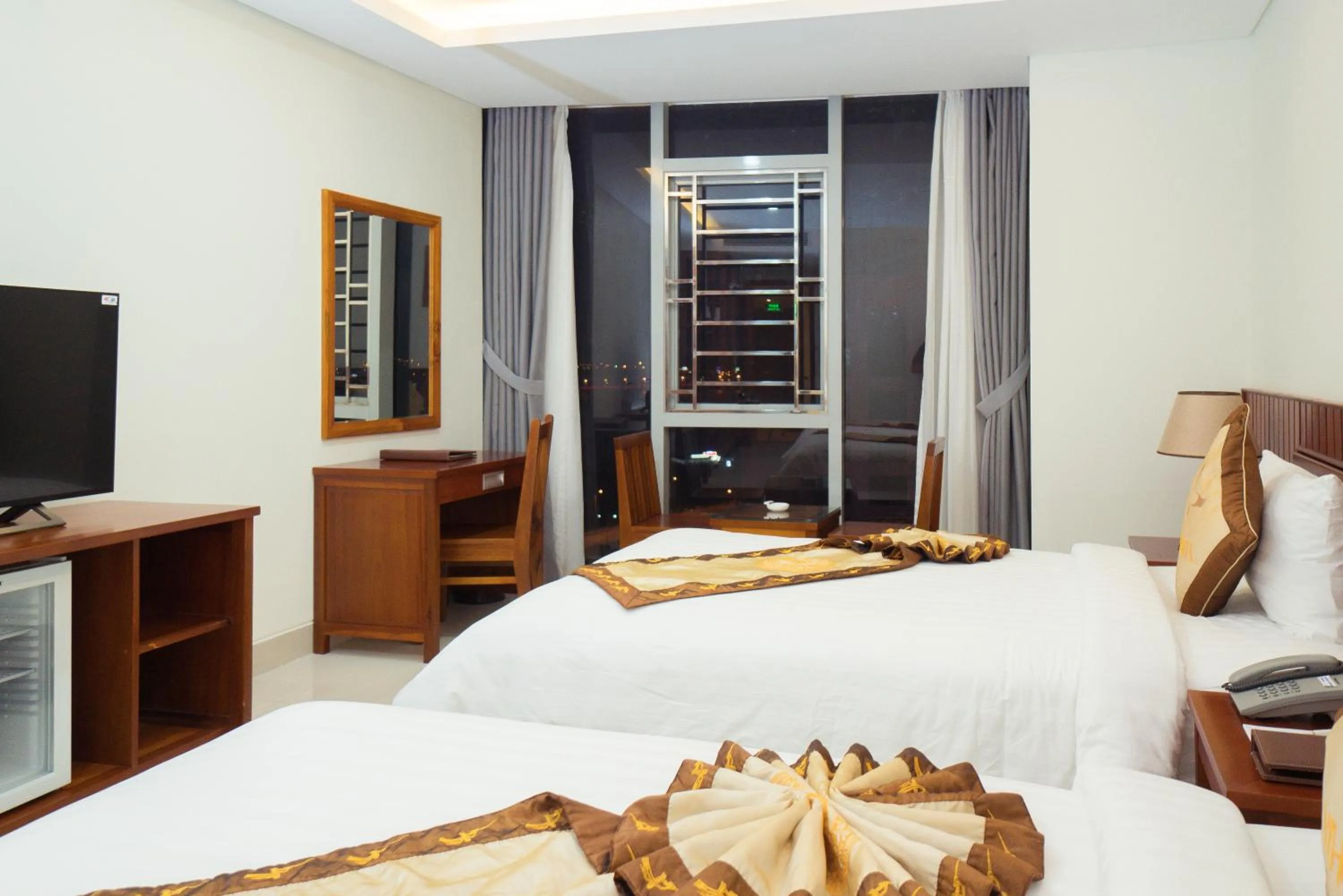 Bed in Vinh Hoang Hotel