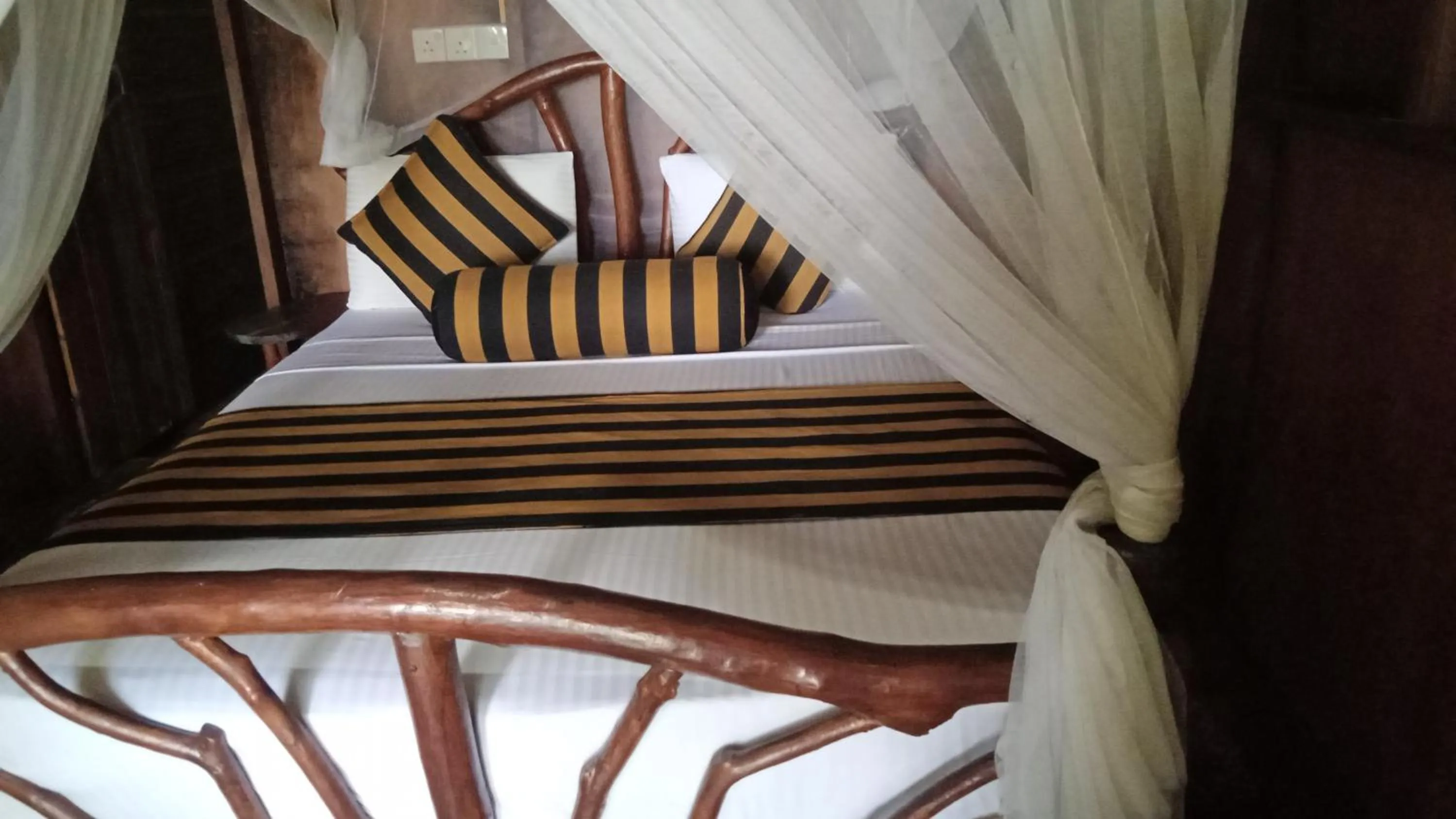 Bed in Sigiriya Rock Gate Resort