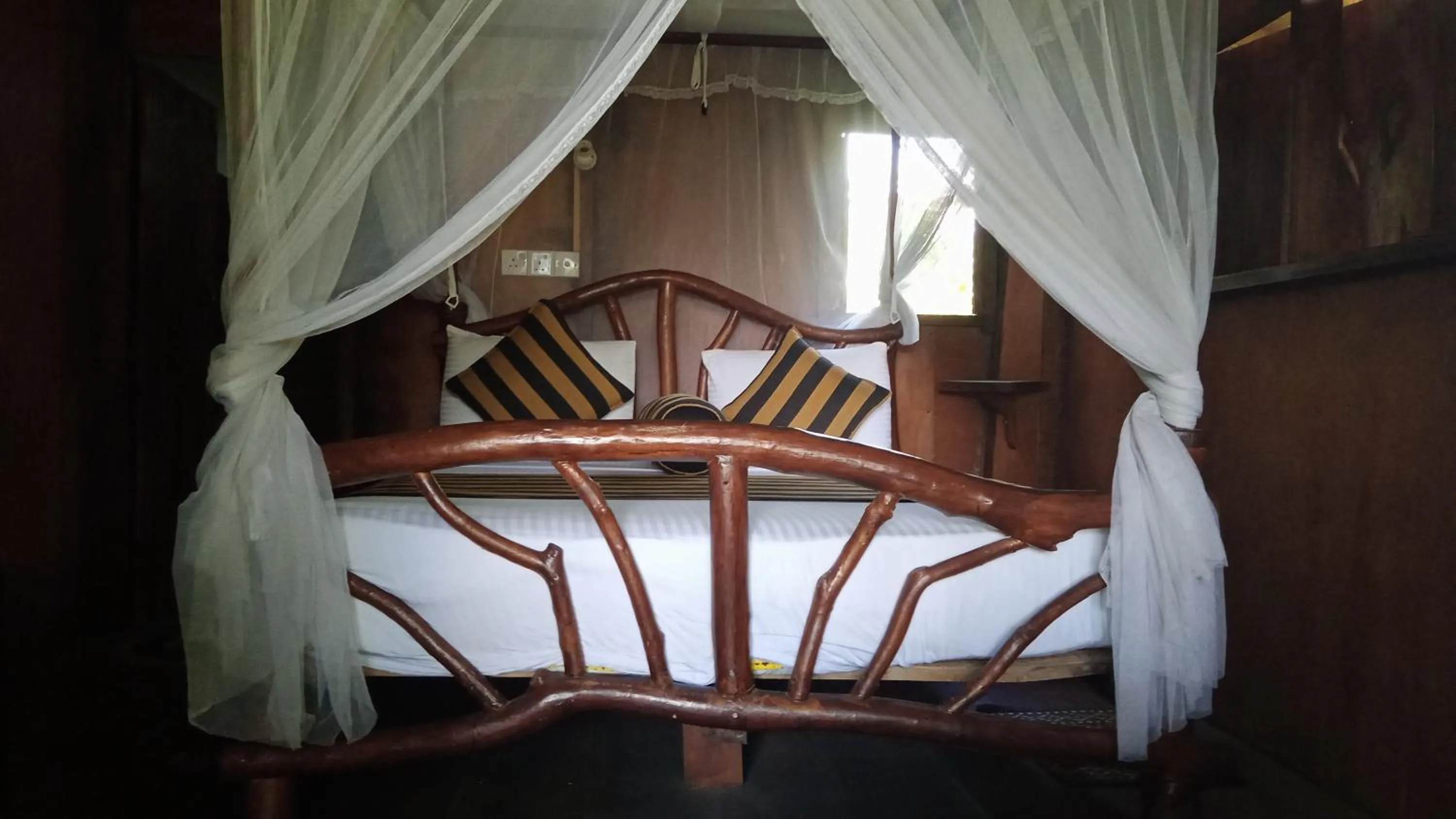 Bed in Sigiriya Rock Gate Resort