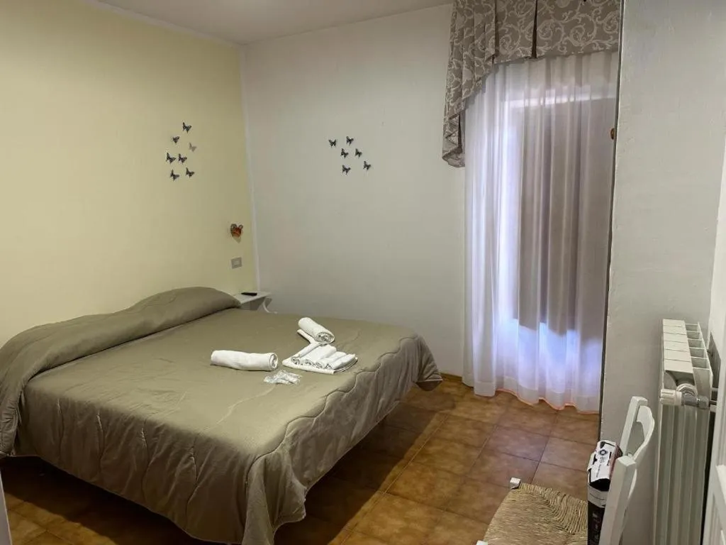 Bedroom in Claudia B&B