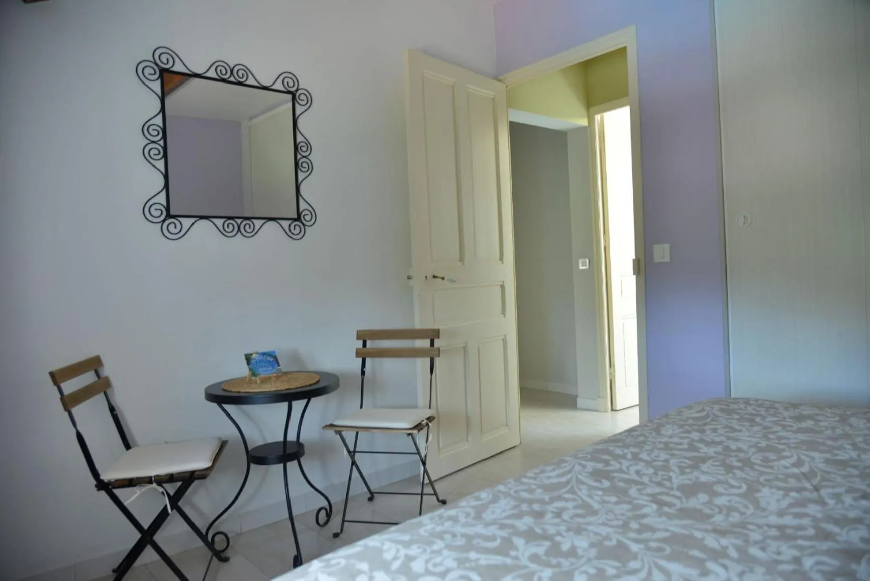 Bedroom in Au Grand Bonheur