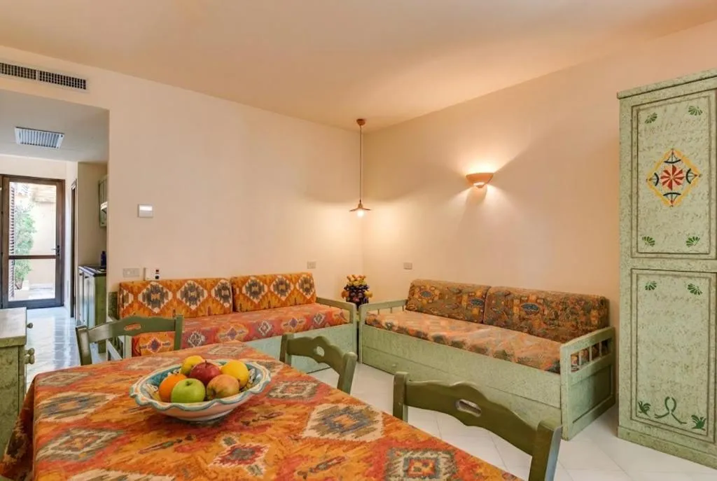 Living room, Bed in Phi Hotel La Tonnara di Bonagia