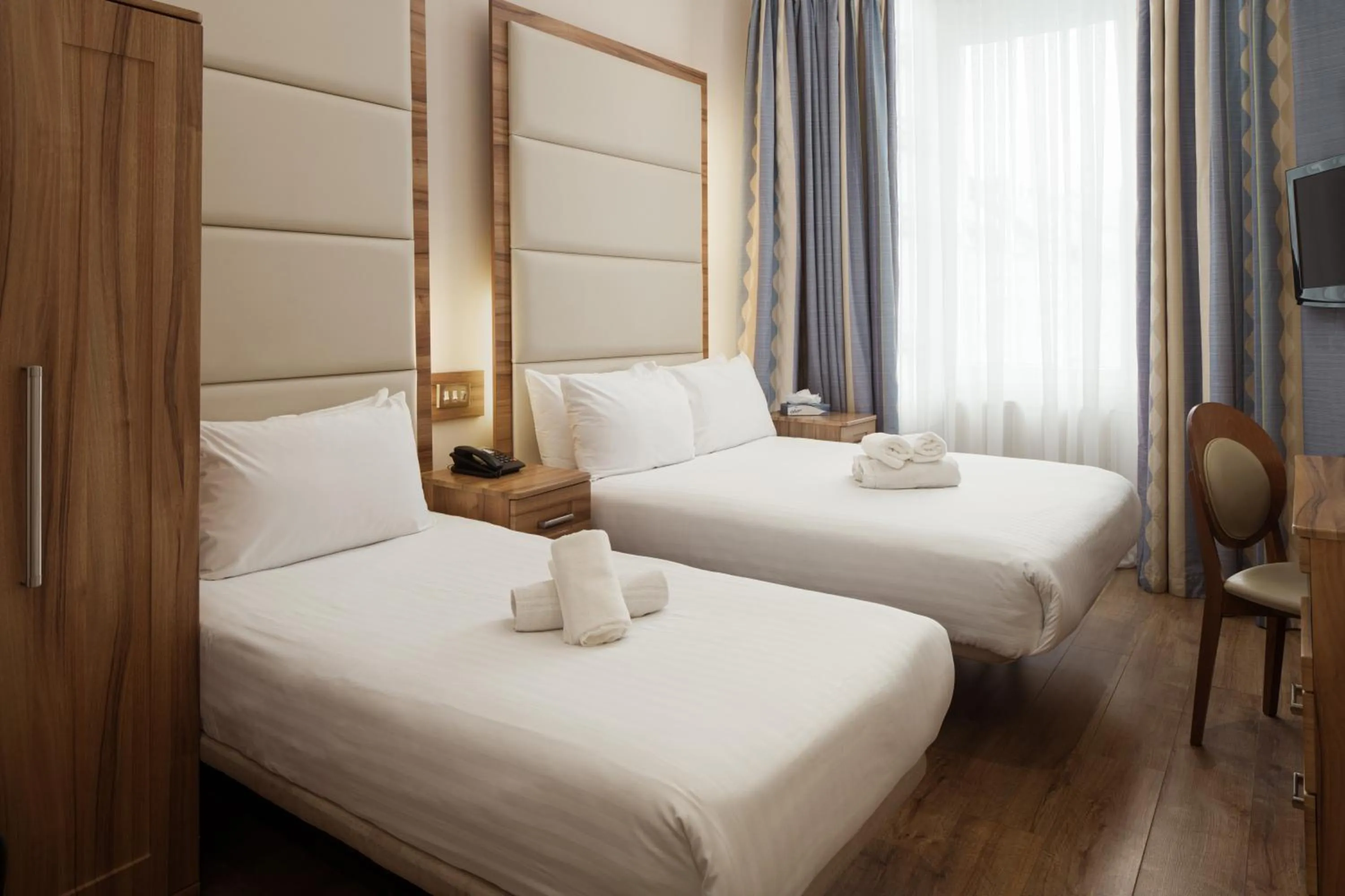 Bed in Royal Eagle Hotel