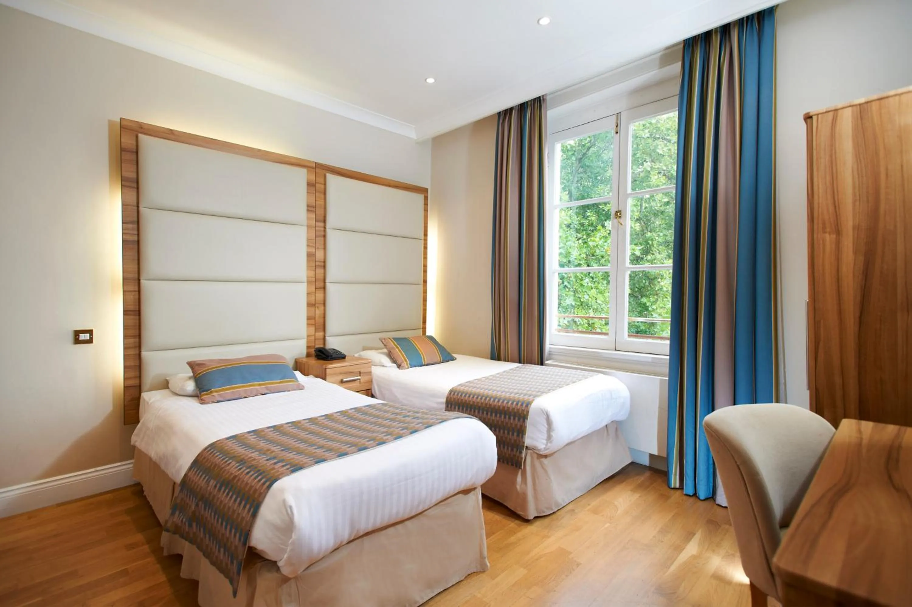 Bed in Royal Eagle Hotel