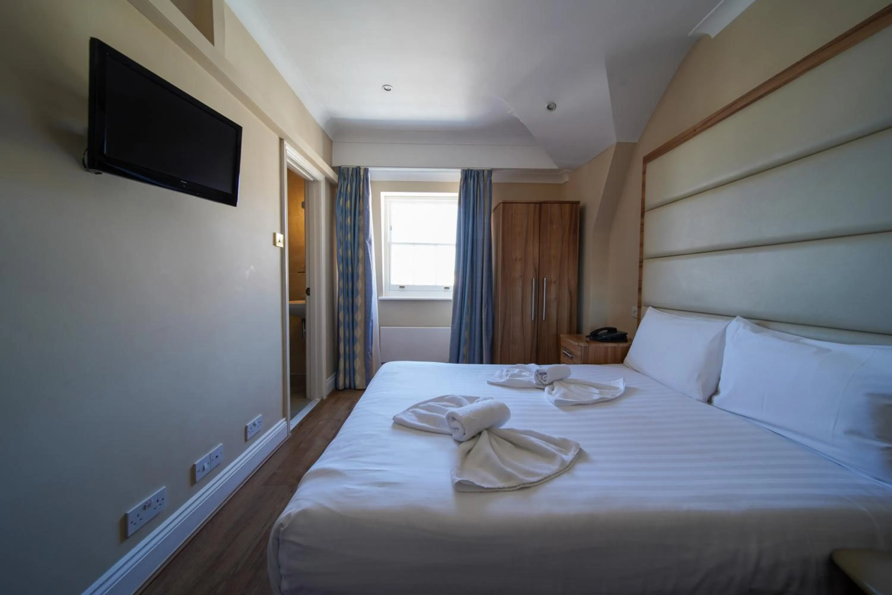 Bed in Royal Eagle Hotel