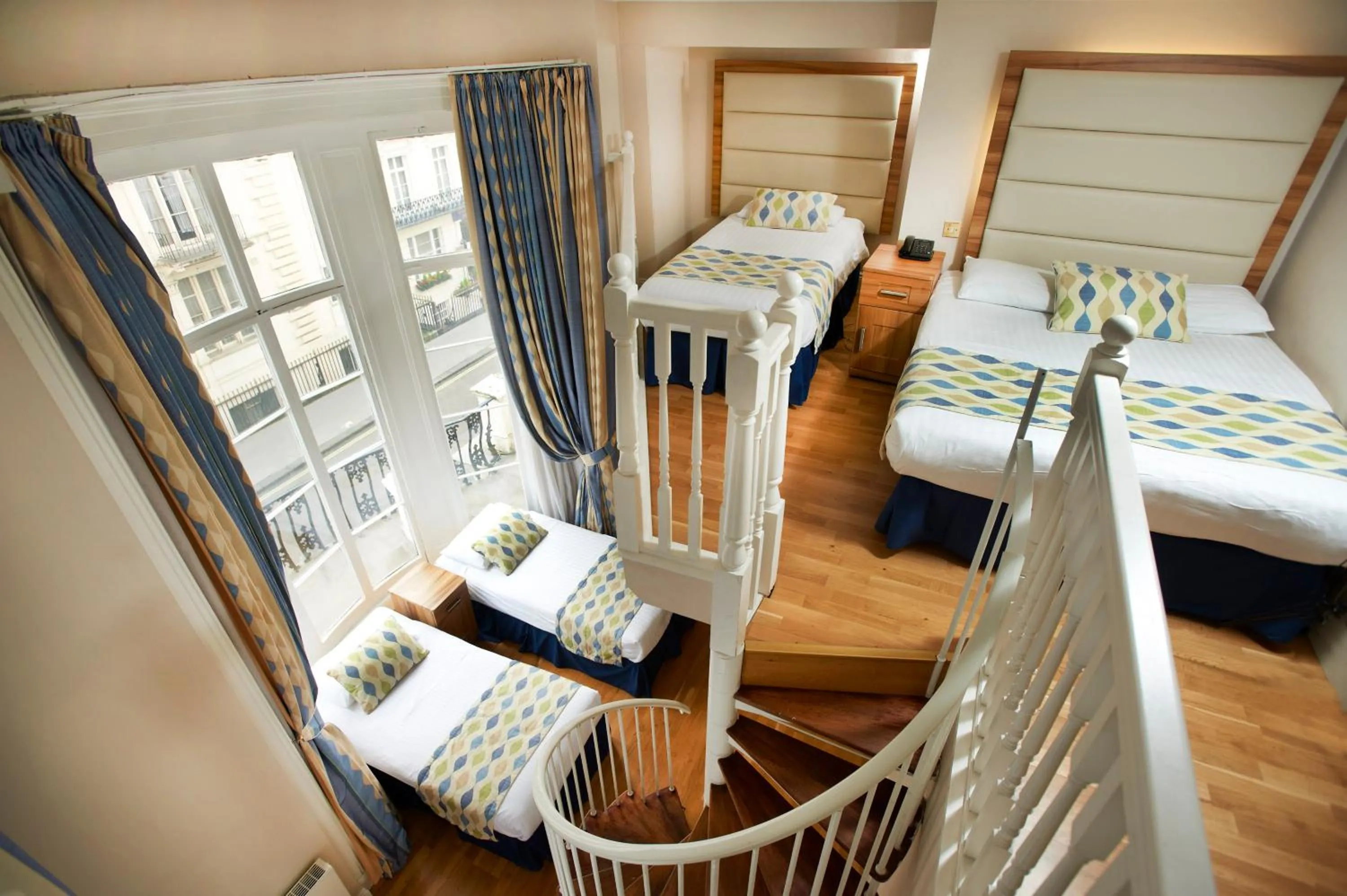 Bed in Royal Eagle Hotel