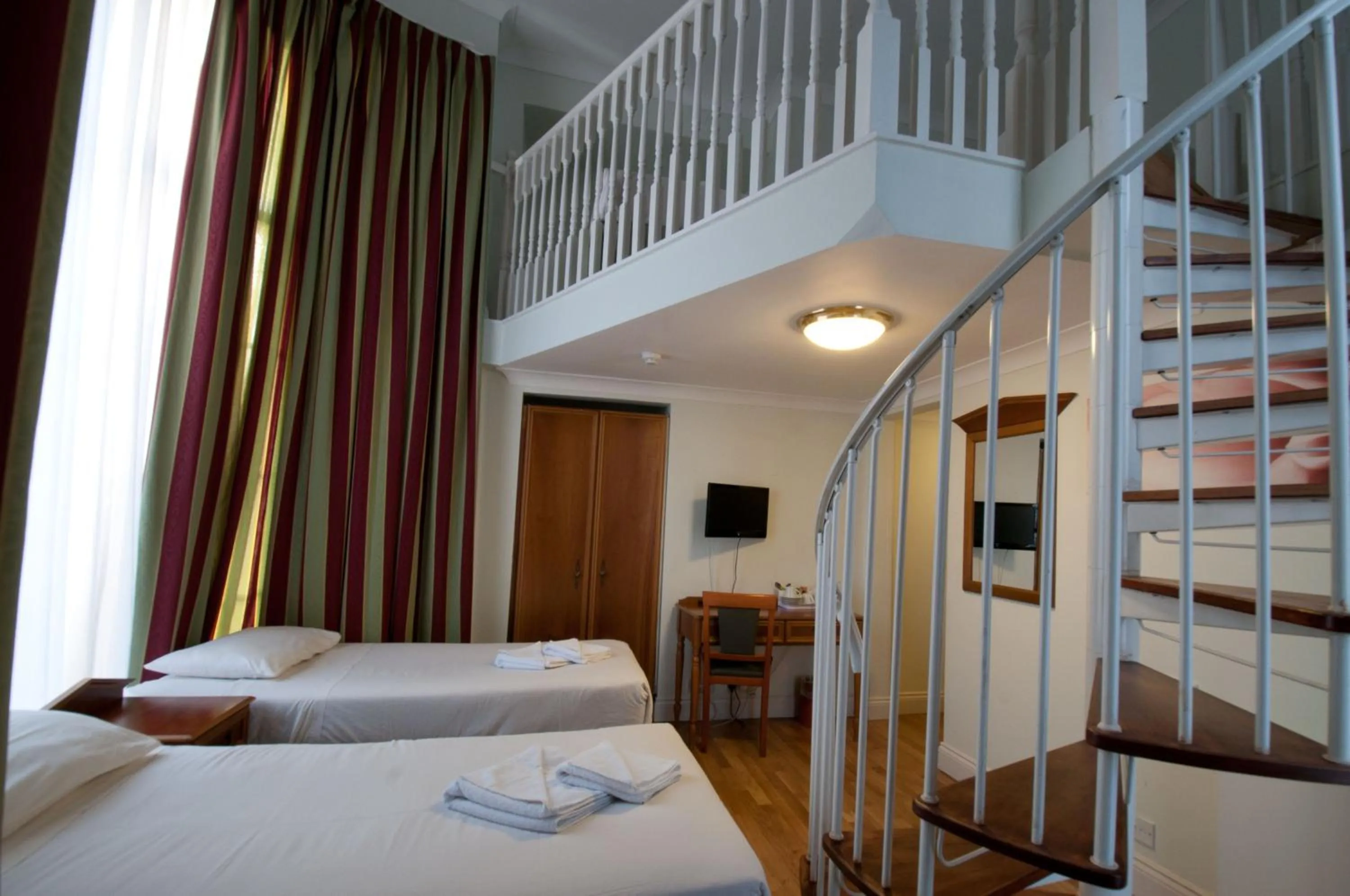 Bed in Royal Eagle Hotel