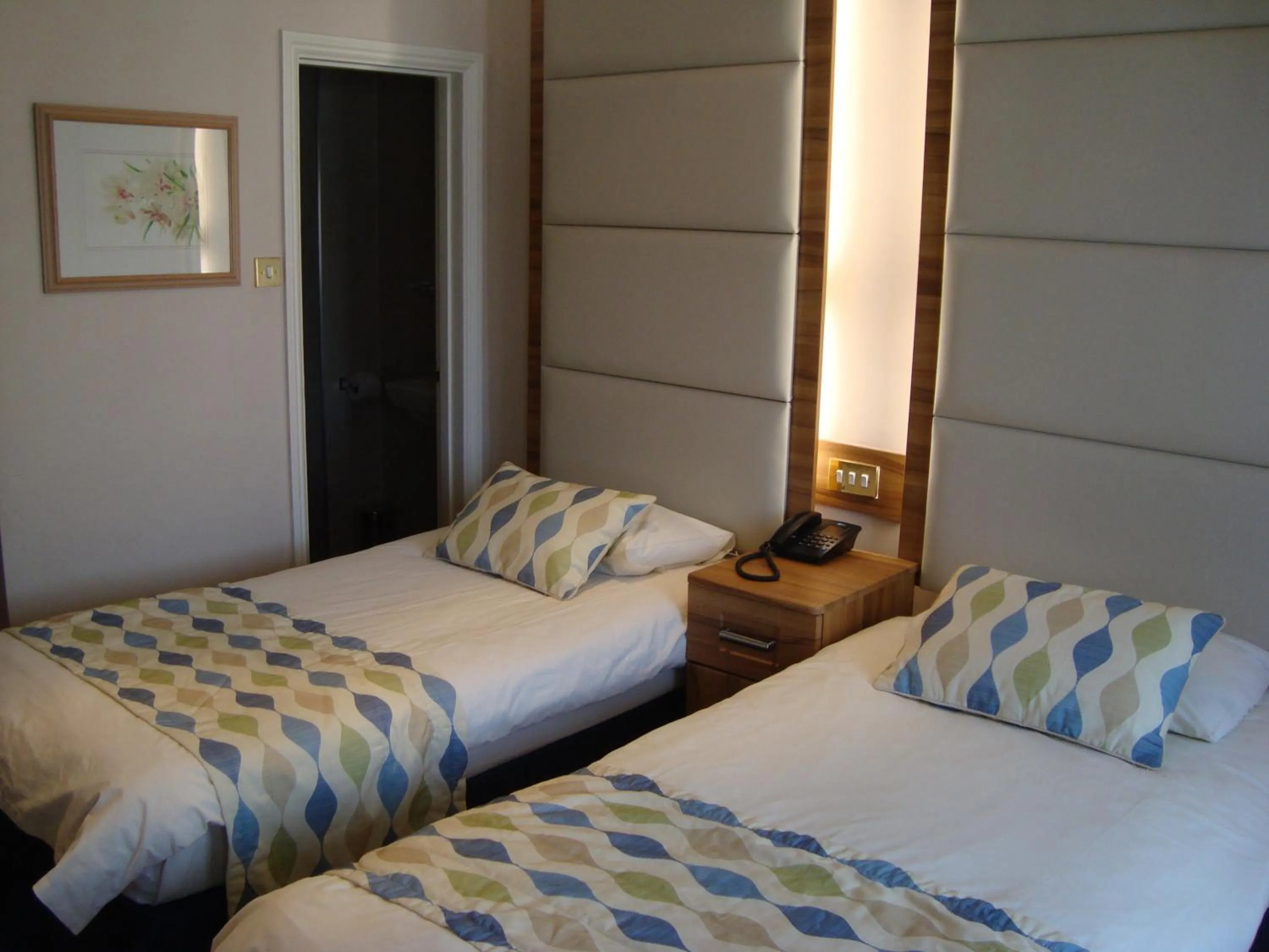 Bed in Royal Eagle Hotel